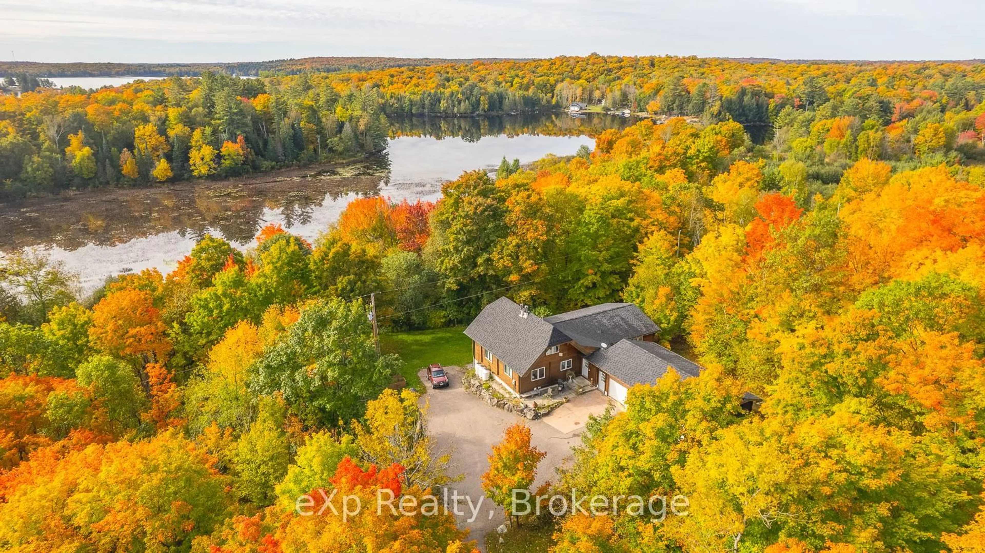 A pic from outside/outdoor area/front of a property/back of a property/a pic from drone, water/lake/river/ocean view for 5331 Hwy 124 Highway, Magnetawan Ontario P0A 1P0
