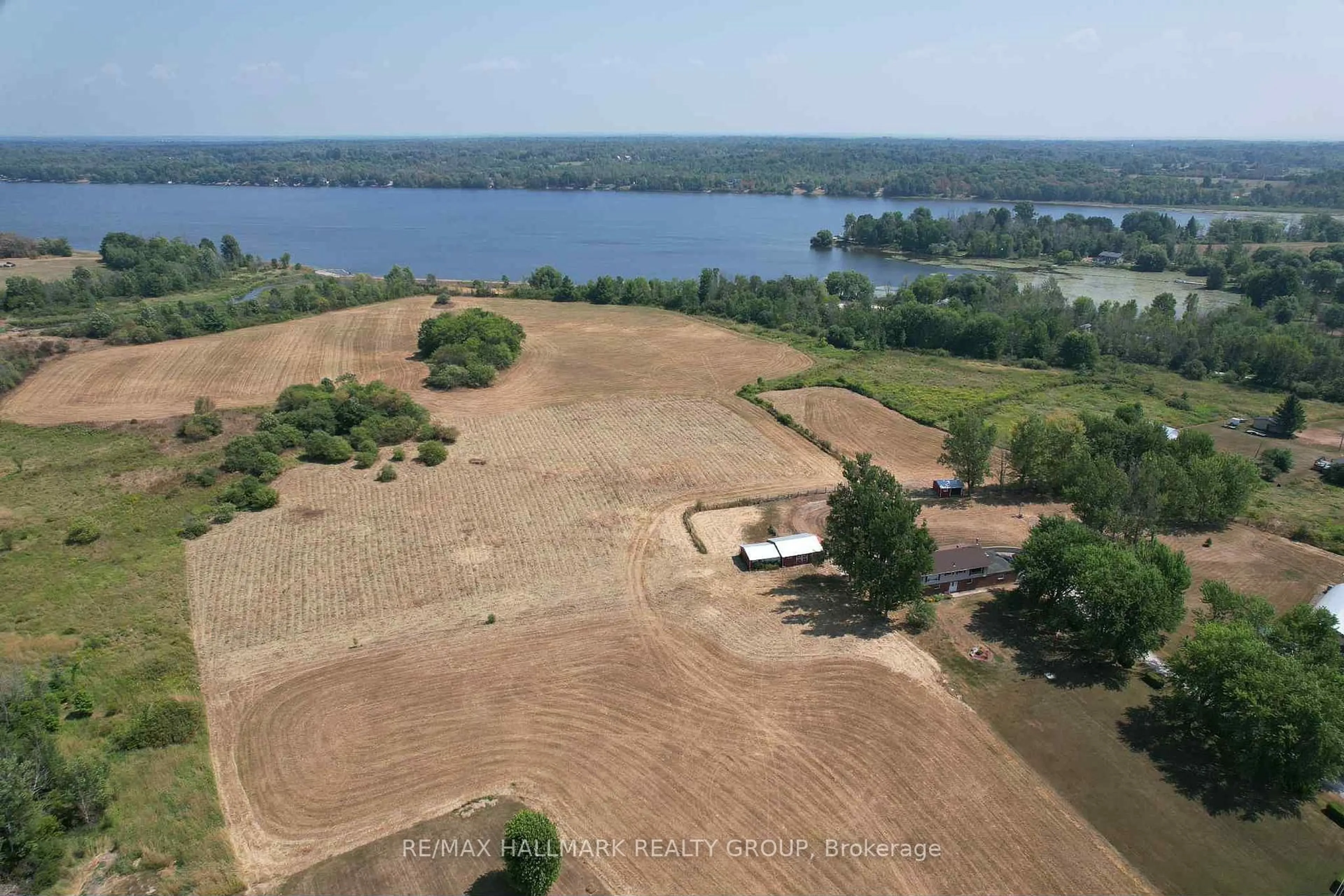 A pic from outside/outdoor area/front of a property/back of a property/a pic from drone, water/lake/river/ocean view for 307 County Rd 5 Rd, Front of Yonge Ontario K0E 1R0