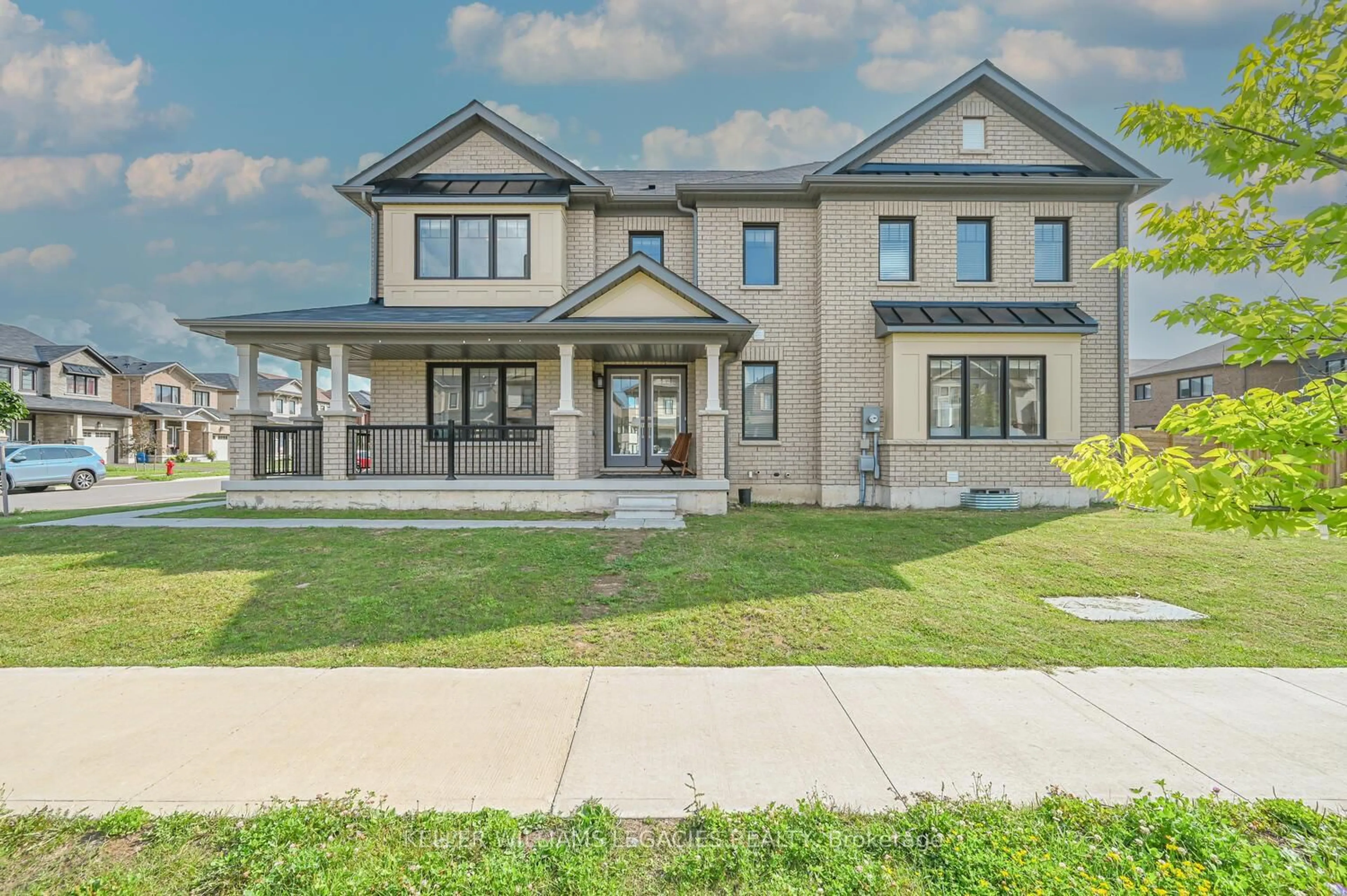 Home with brick exterior material, street for 4 July Ave, Hamilton Ontario L8K 5R9