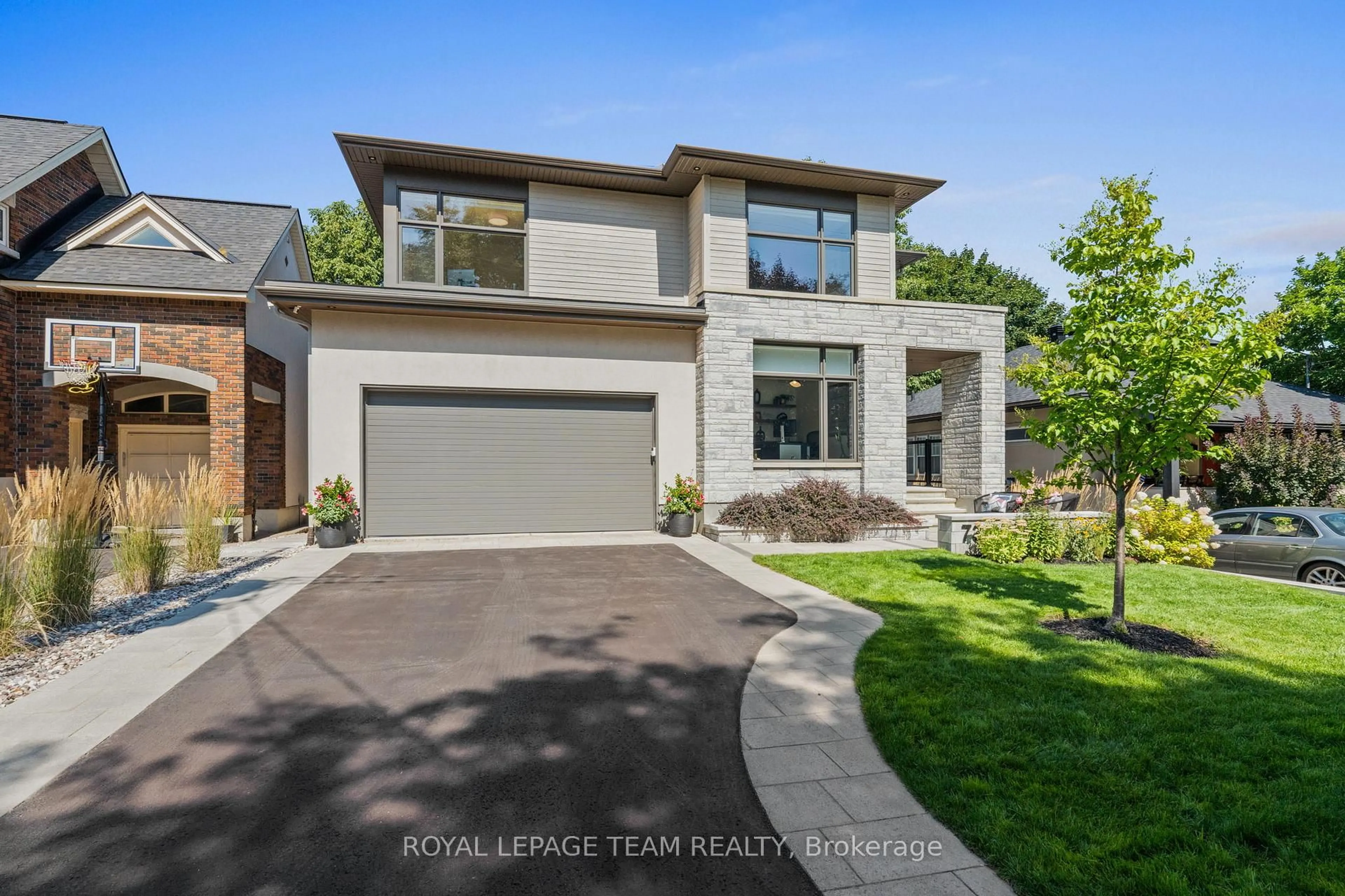 Home with brick exterior material, street for 73 Kenora St, Ottawa Ontario K1Y 3K9
