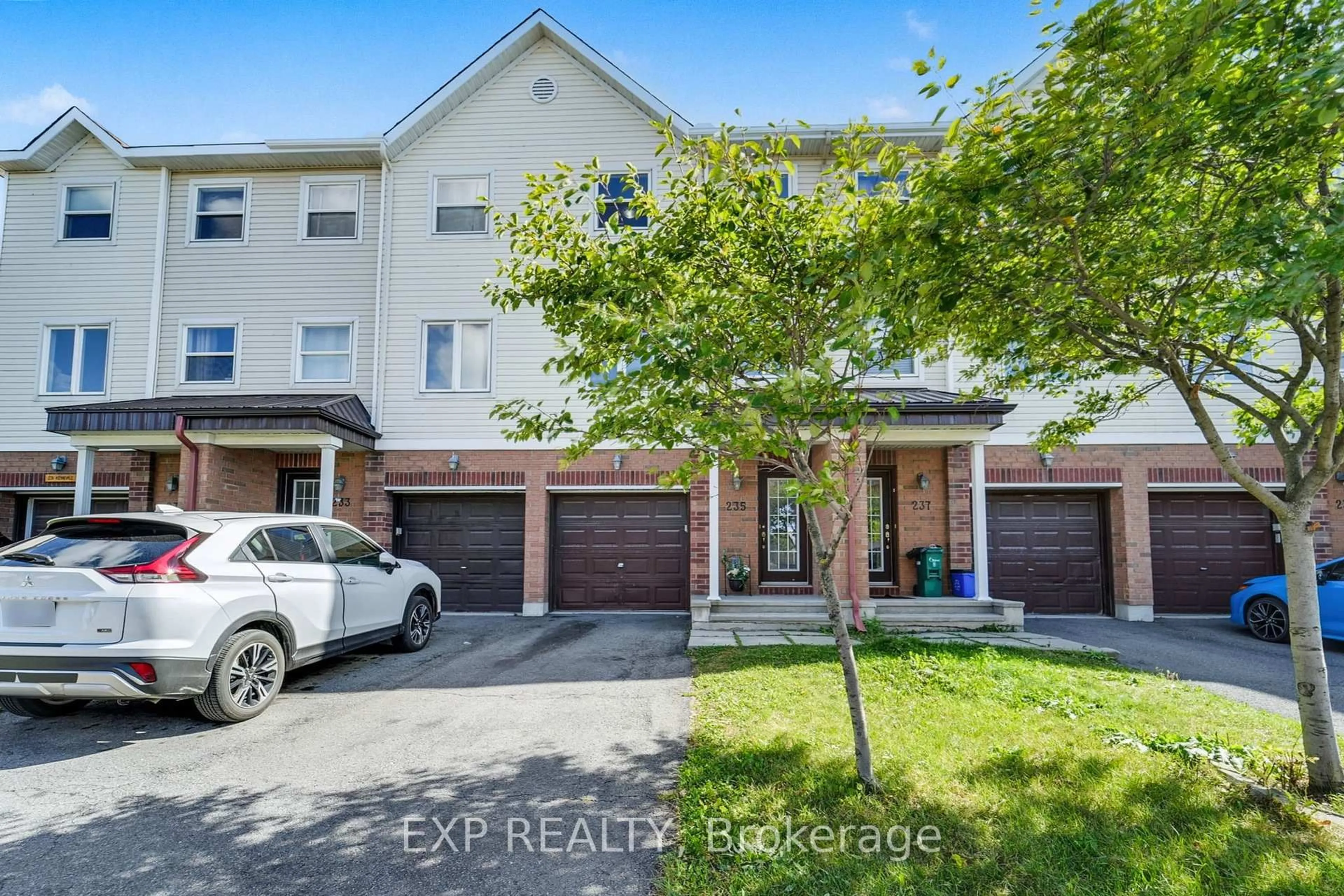 A pic from outside/outdoor area/front of a property/back of a property/a pic from drone, street for 235 Kennevale Dr, Ottawa Ontario K2J 0C3