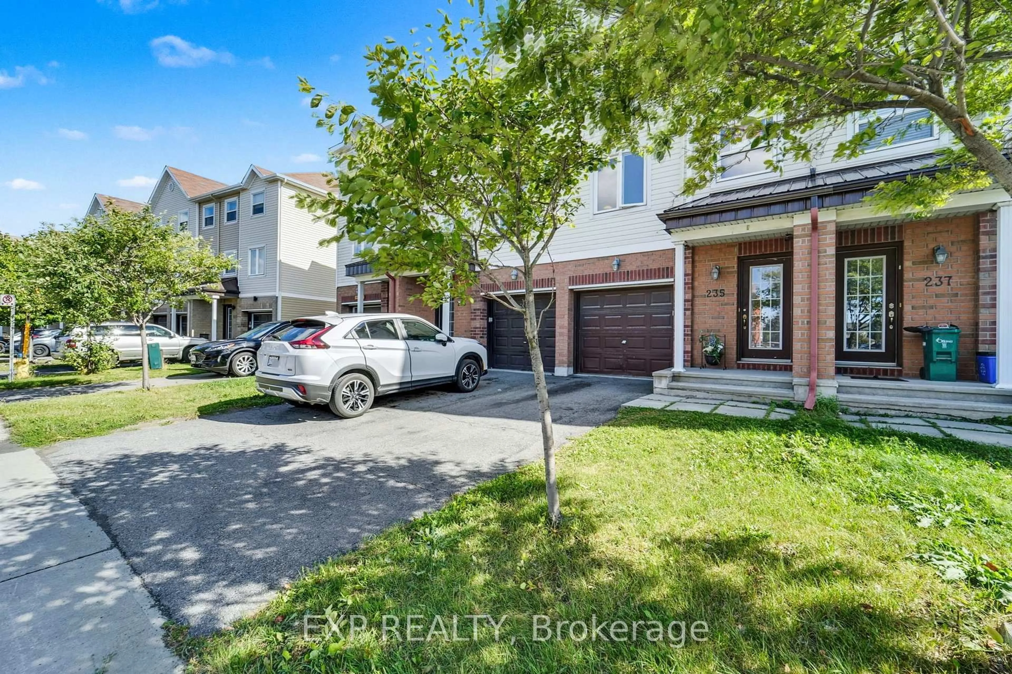 A pic from outside/outdoor area/front of a property/back of a property/a pic from drone, street for 235 Kennevale Dr, Ottawa Ontario K2J 0C3