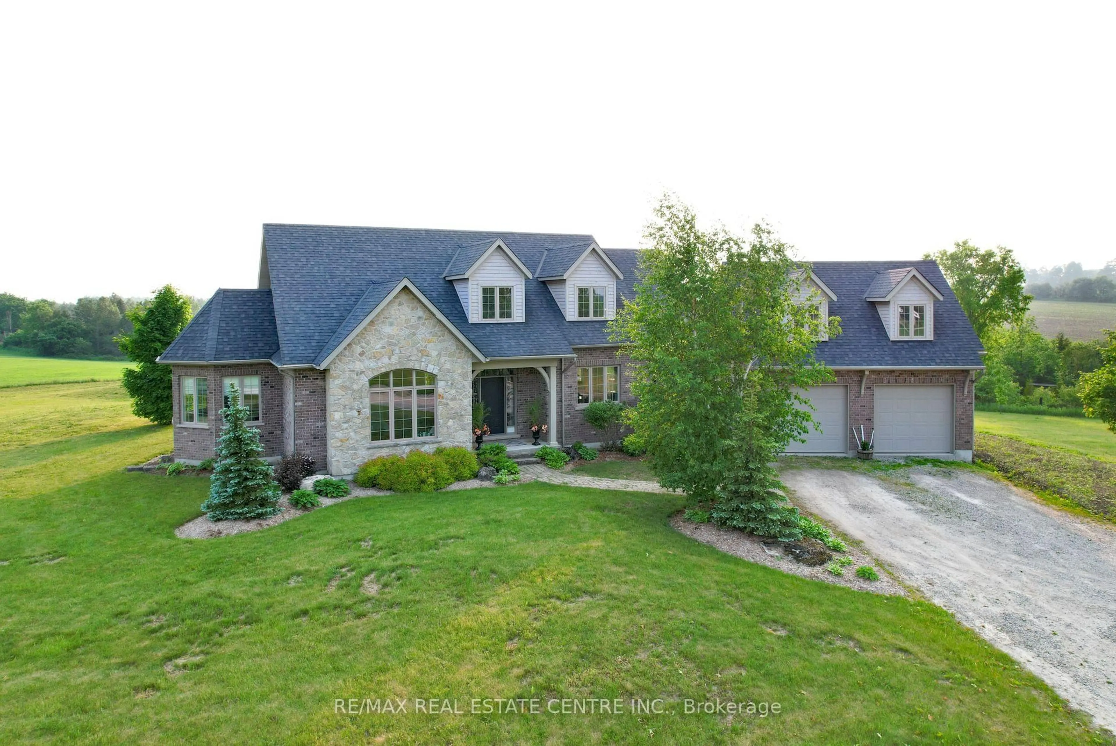 A pic from outside/outdoor area/front of a property/back of a property/a pic from drone, street for 293138 8th Line, Amaranth Ontario L9W 0T6