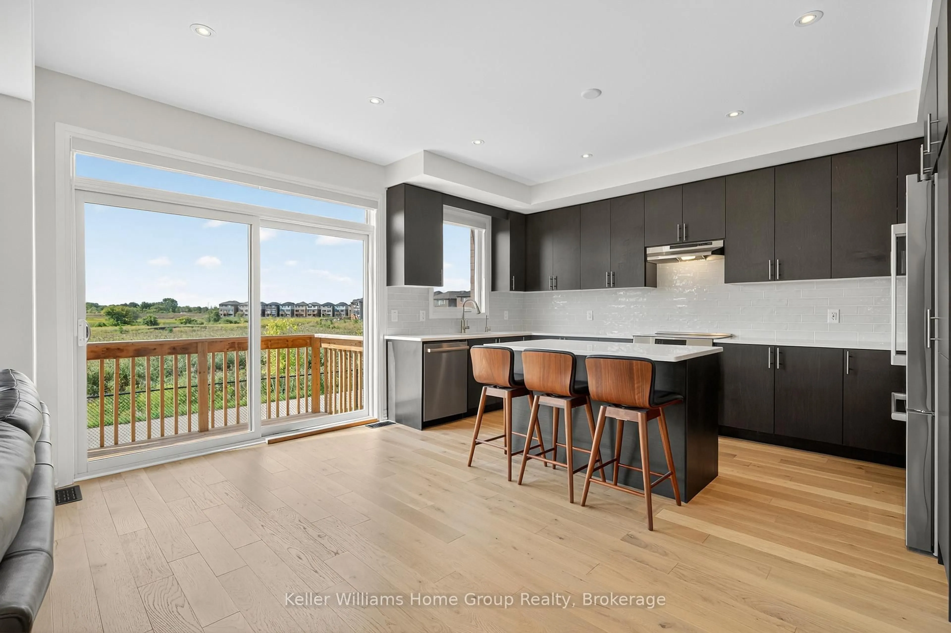 Open concept kitchen, wood/laminate floor for 153 BLACKLOCK St, Cambridge Ontario N1S 0E3