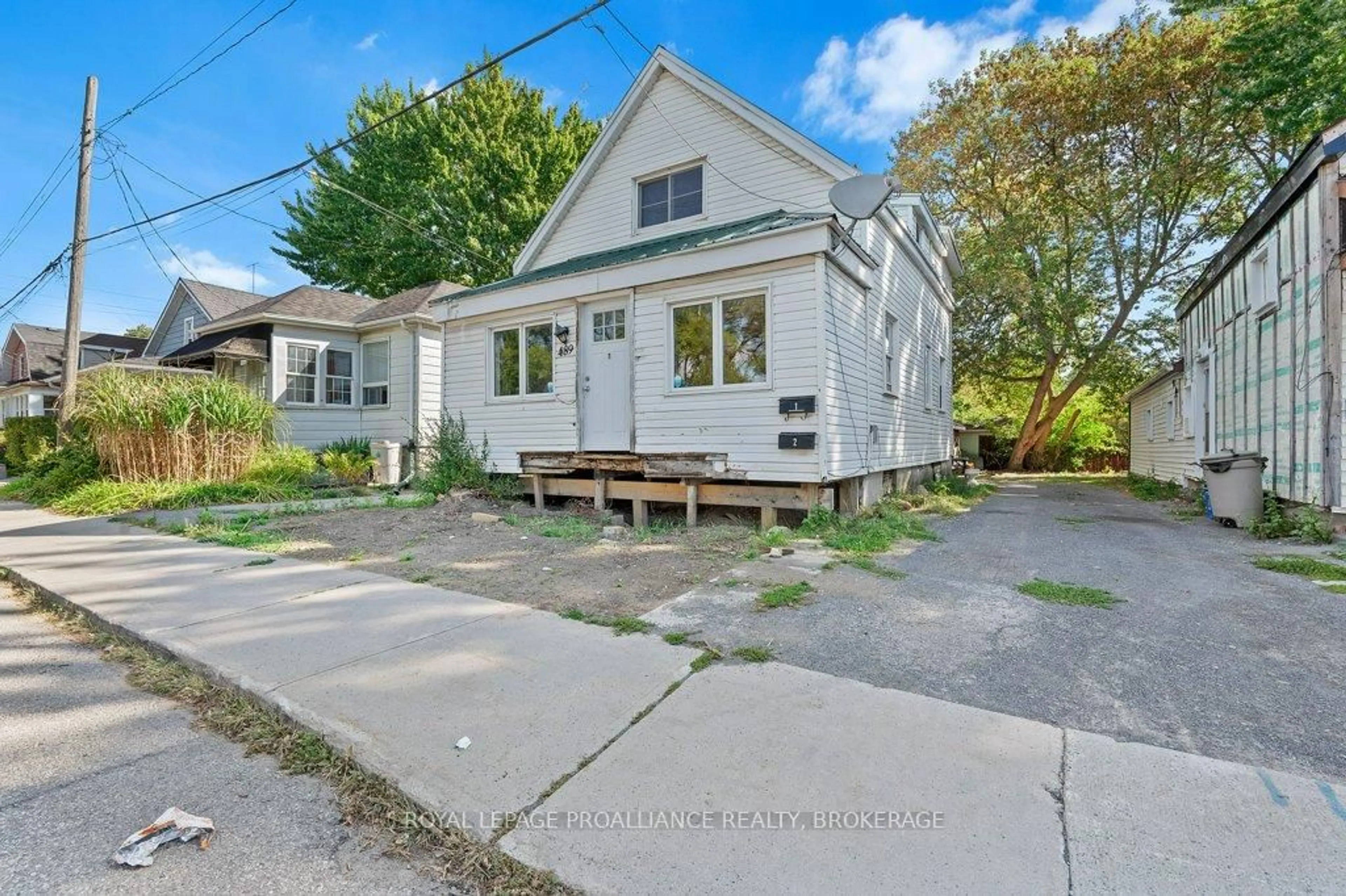 A pic from outside/outdoor area/front of a property/back of a property/a pic from drone, street for 489 Alfred St, Kingston Ontario K7K 4J4
