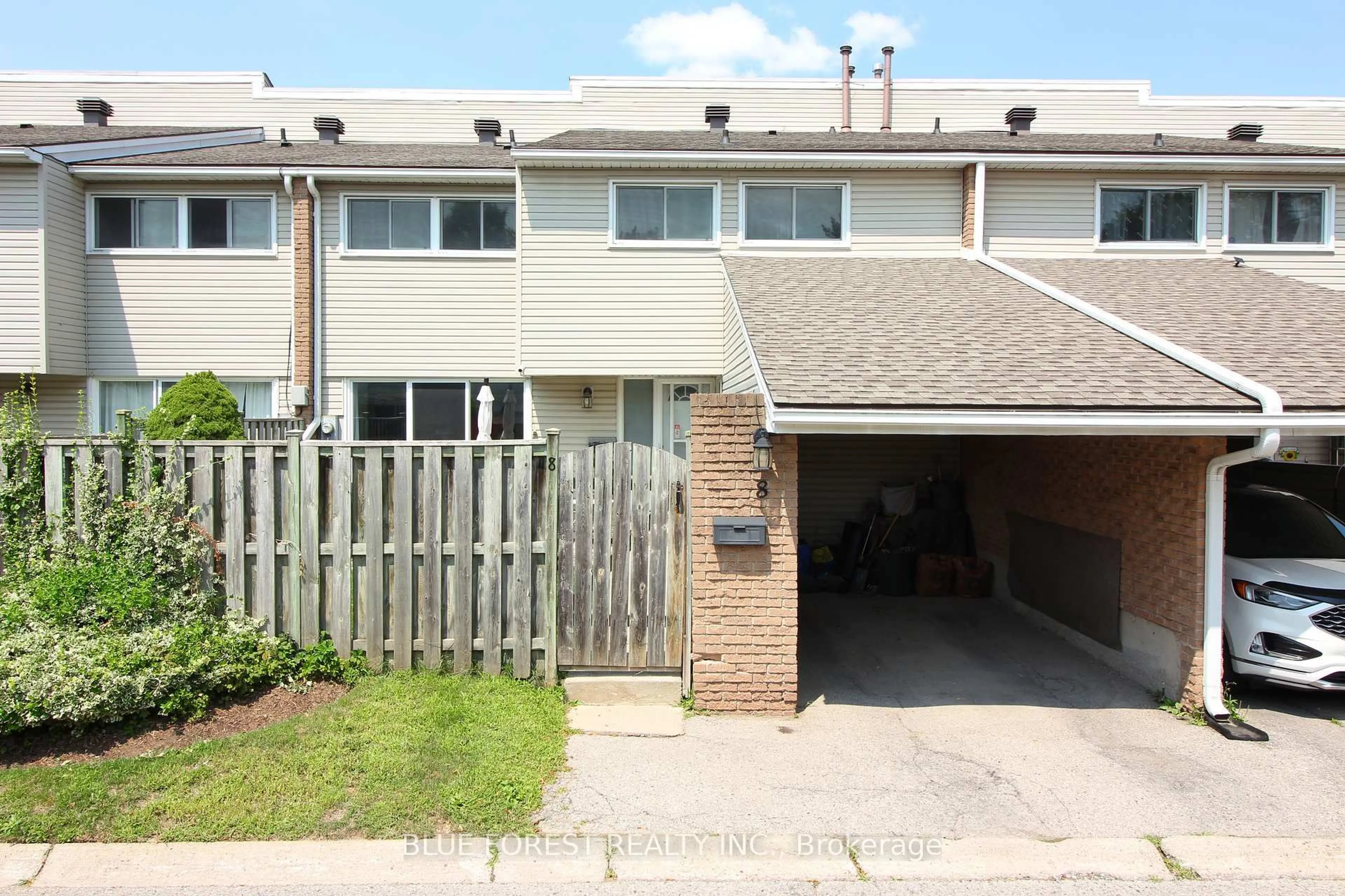 A pic from outside/outdoor area/front of a property/back of a property/a pic from drone, street for 590 Millbank Dr #8, London South Ontario N6E 2H2