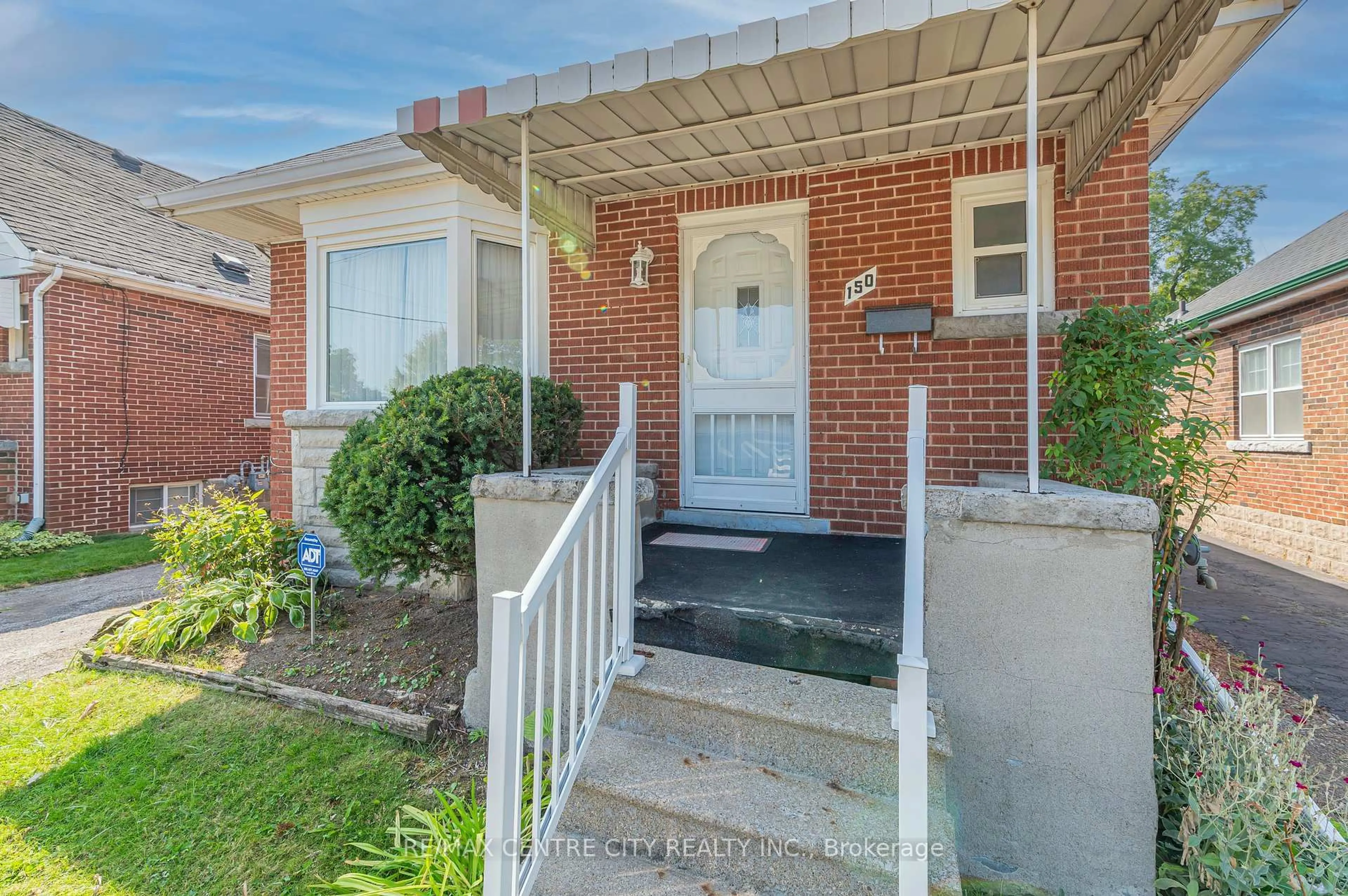 Home with brick exterior material, street for 150 Brucedale Ave, Hamilton Ontario L9A 1N6