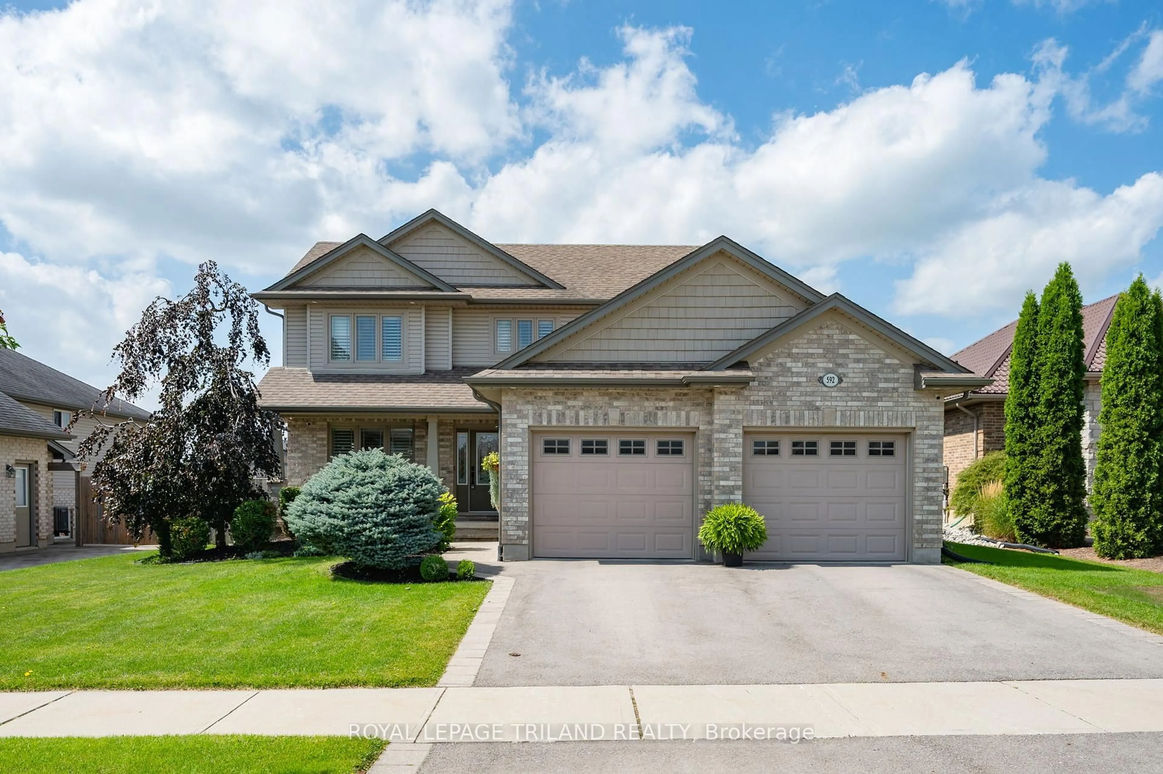 Home with brick exterior material, street for 592 Darcy Dr, Strathroy-Caradoc Ontario N7G 4L2