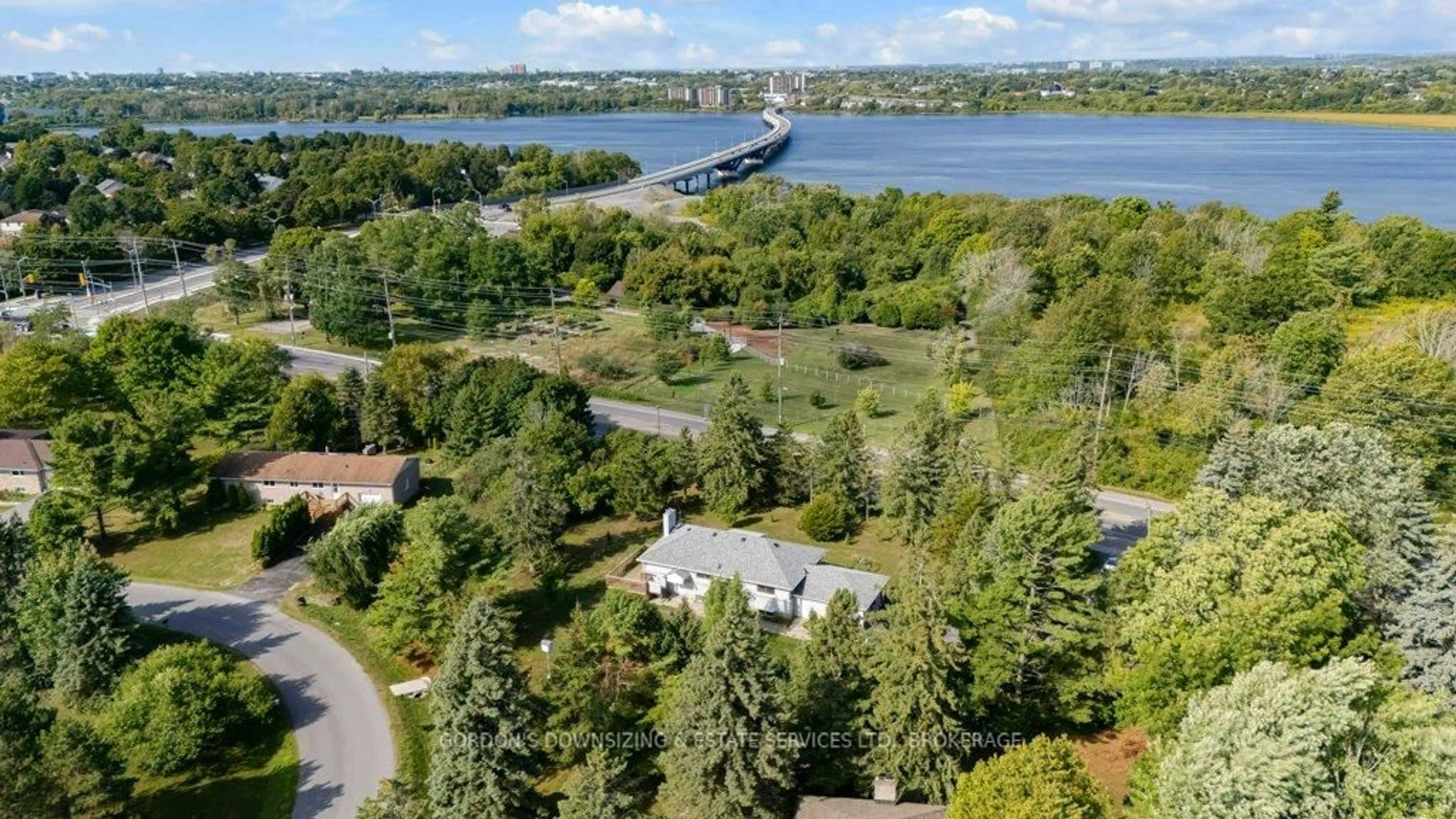 A pic from outside/outdoor area/front of a property/back of a property/a pic from drone, water/lake/river/ocean view for 943 Highway 15, Kingston Ontario K7L 0C3