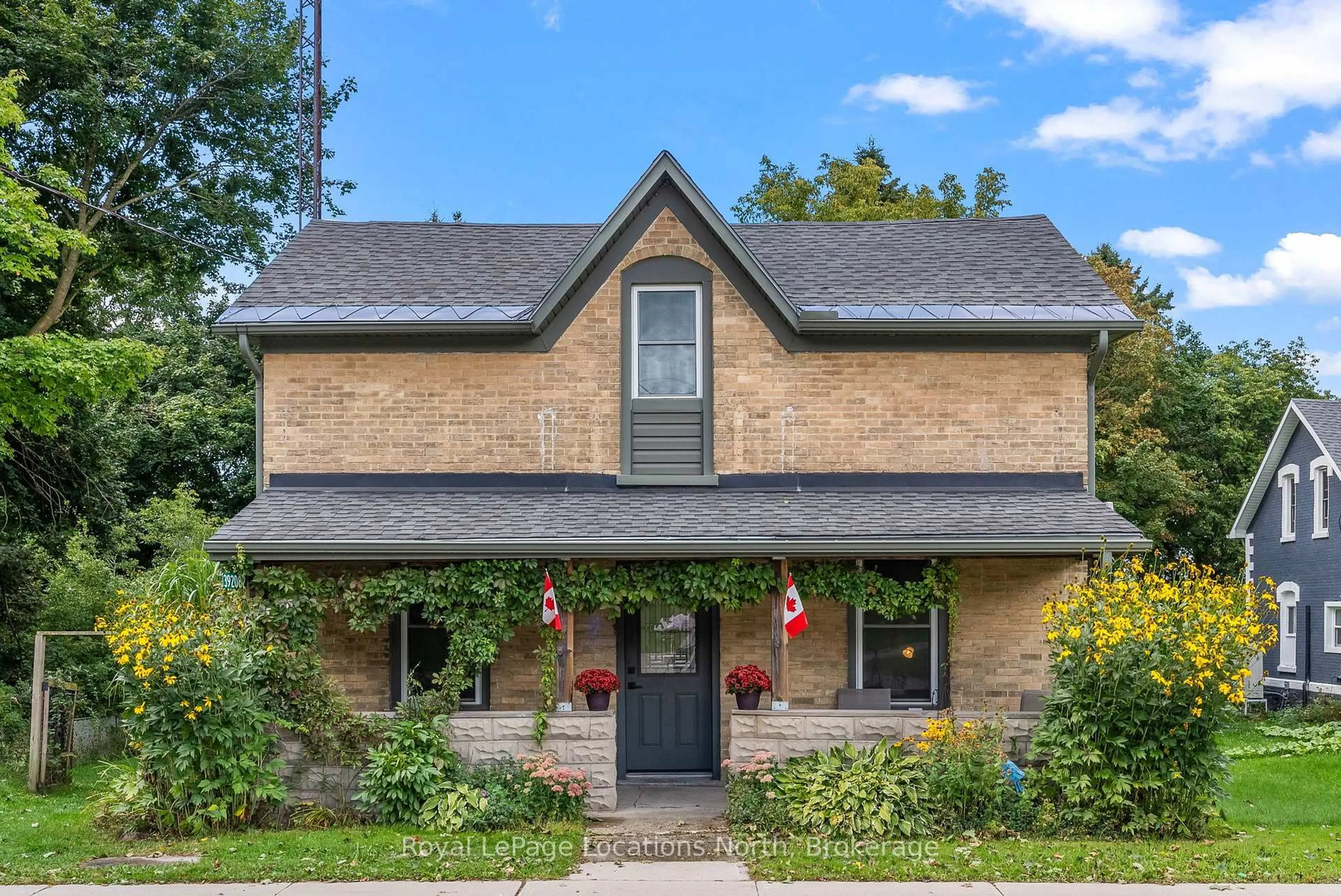 Home with brick exterior material, street for 392082 Grey 109 Rd, Southgate Ontario N0G 2A0