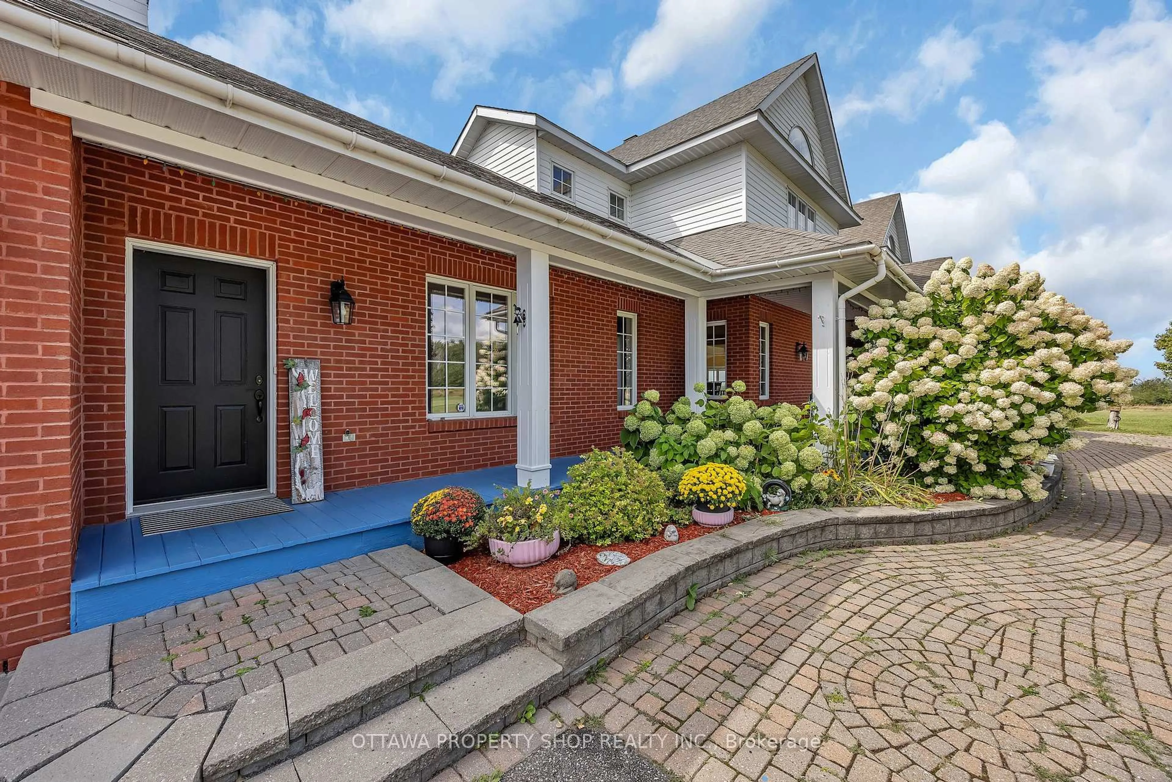 Home with brick exterior material, street for 3057-3059 Greenland Rd, Ottawa Ontario K0A 1T0