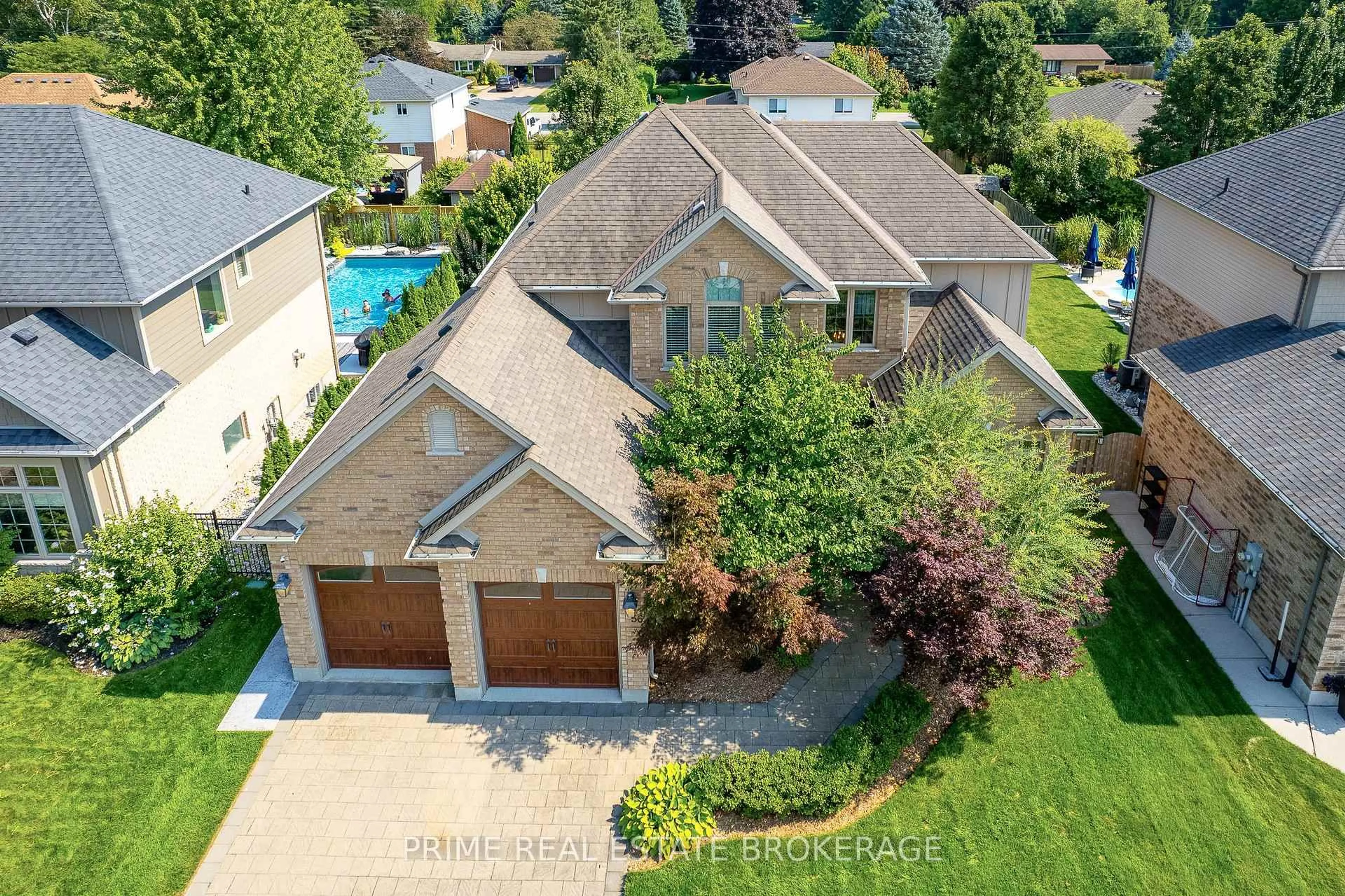 A pic from outside/outdoor area/front of a property/back of a property/a pic from drone, street for 56 Fieldstone Cres, Middlesex Centre Ontario N0L 1R0