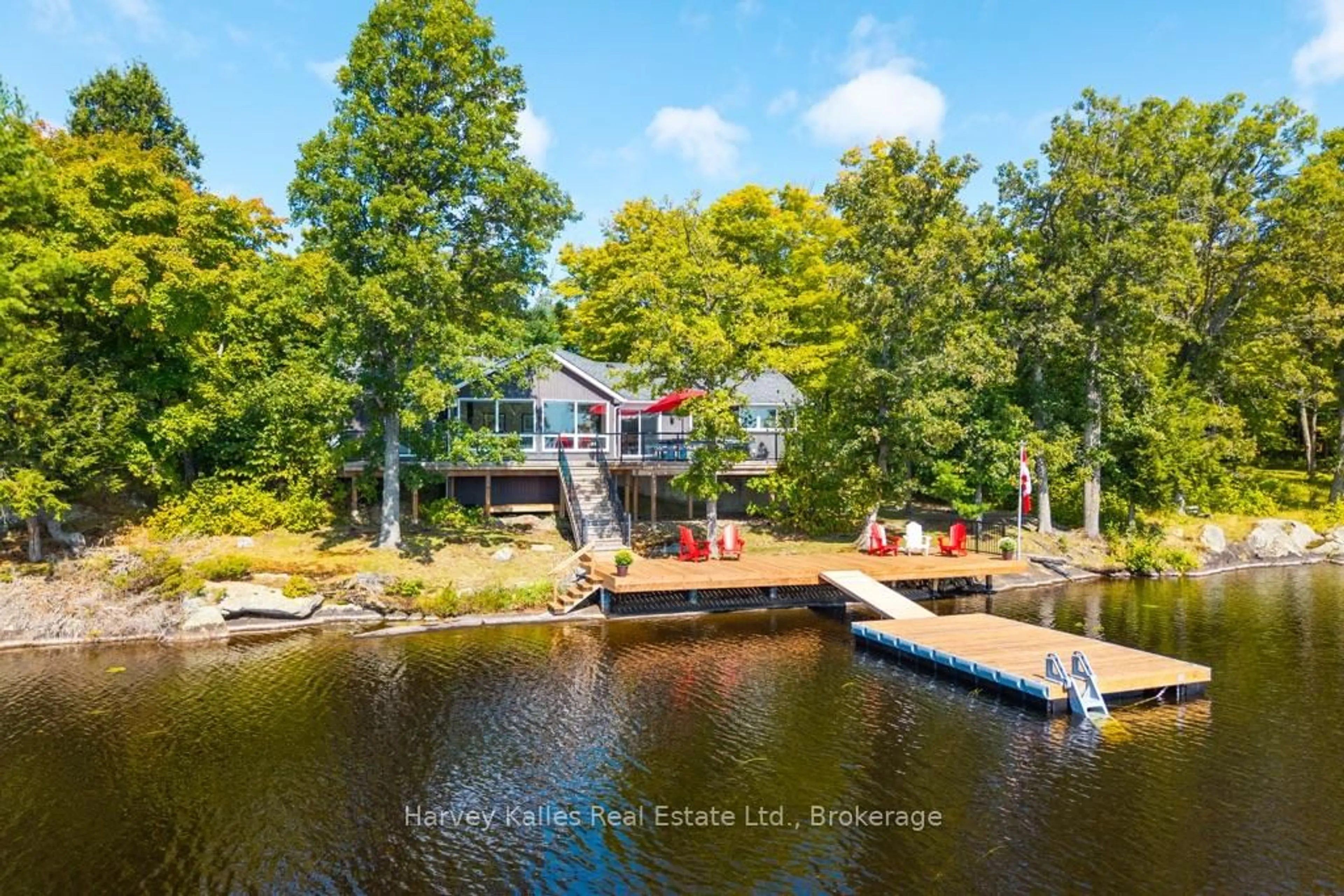 A pic from outside/outdoor area/front of a property/back of a property/a pic from drone, water/lake/river/ocean view for 27 Lizzie's Lane, McKellar Ontario P2A 0B4