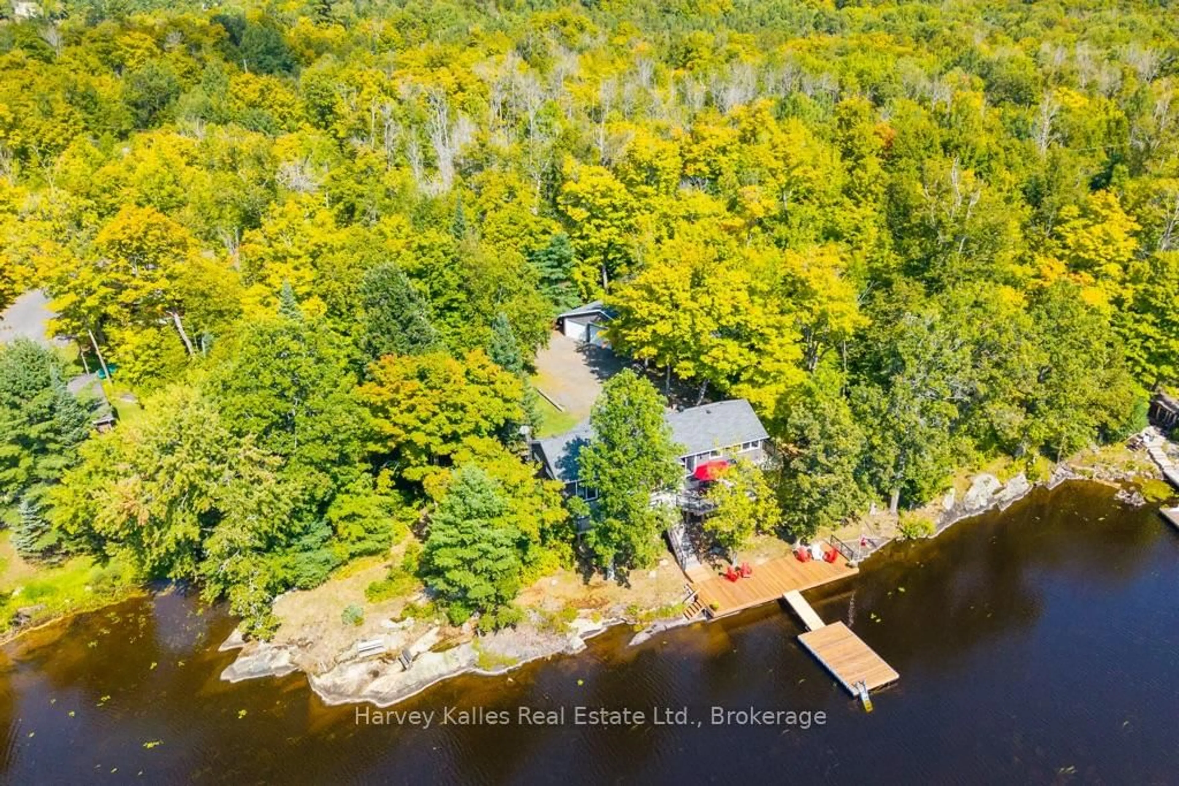 A pic from outside/outdoor area/front of a property/back of a property/a pic from drone, water/lake/river/ocean view for 27 Lizzie's Lane, McKellar Ontario P2A 0B4