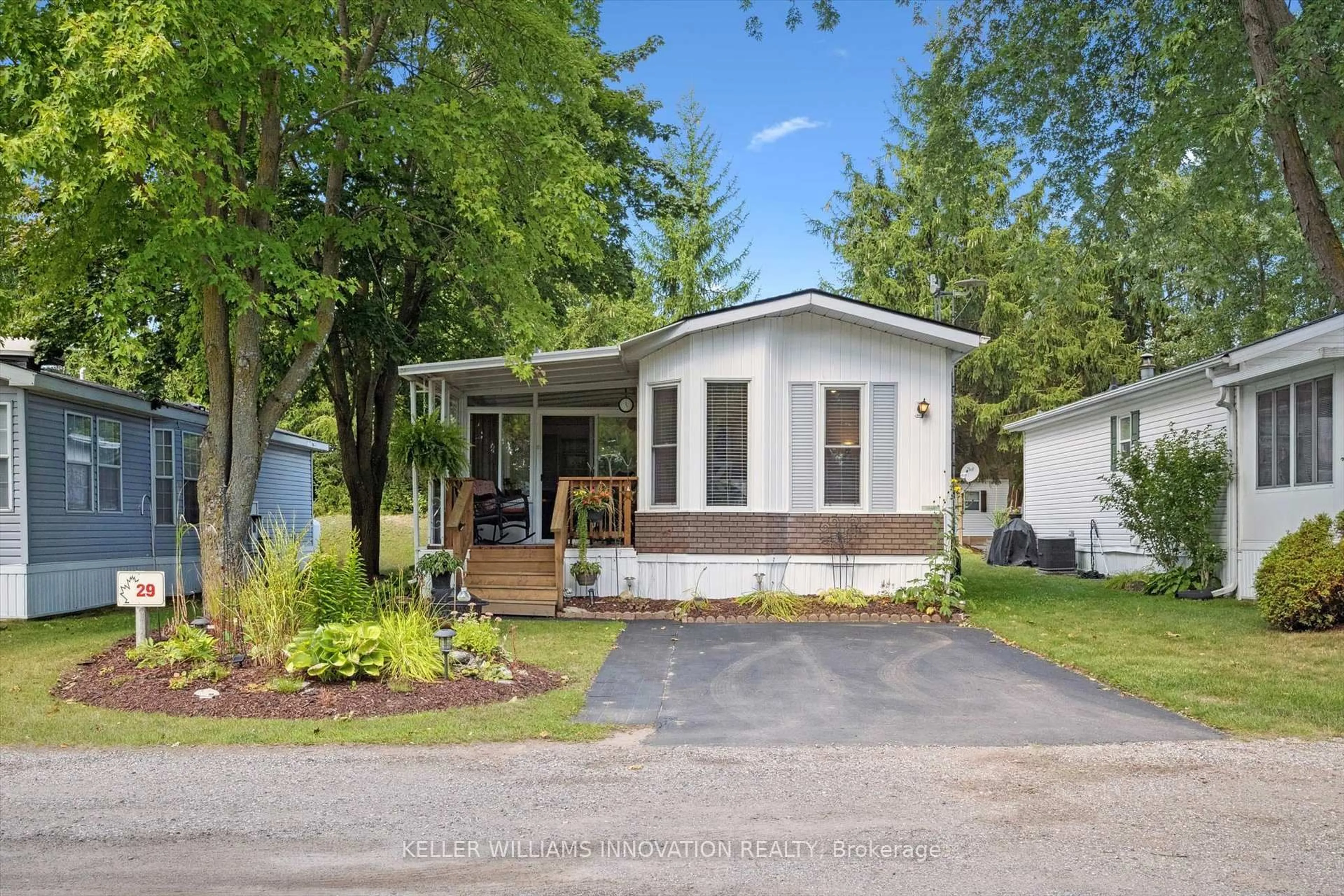 Home with vinyl exterior material, street for 580 Beaver Creek Rd #29, Waterloo Ontario N2V 3Z4