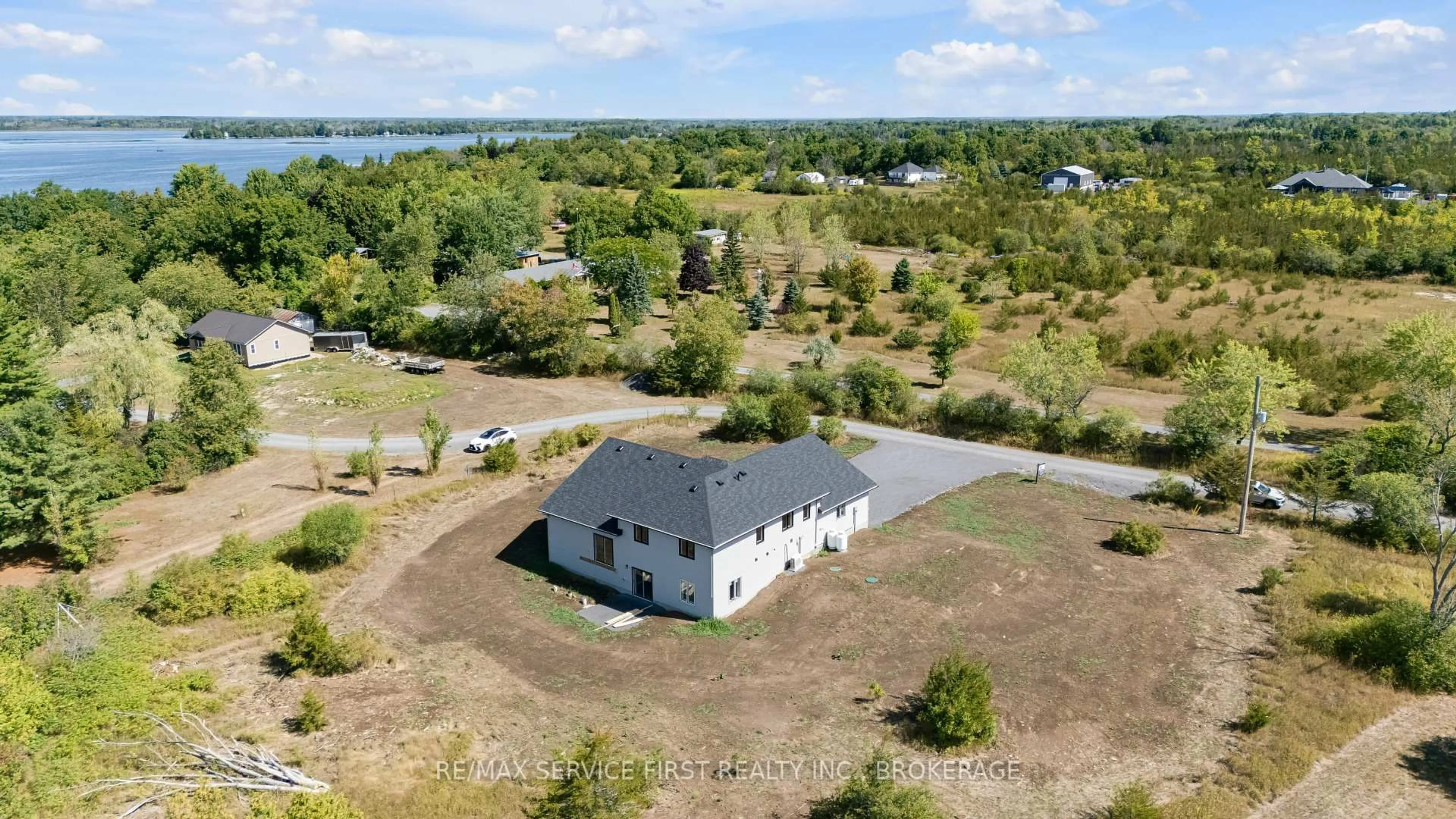 A pic from outside/outdoor area/front of a property/back of a property/a pic from drone, water/lake/river/ocean view for 22 Cranberry Lane, Yarker Ontario K0K 3N0