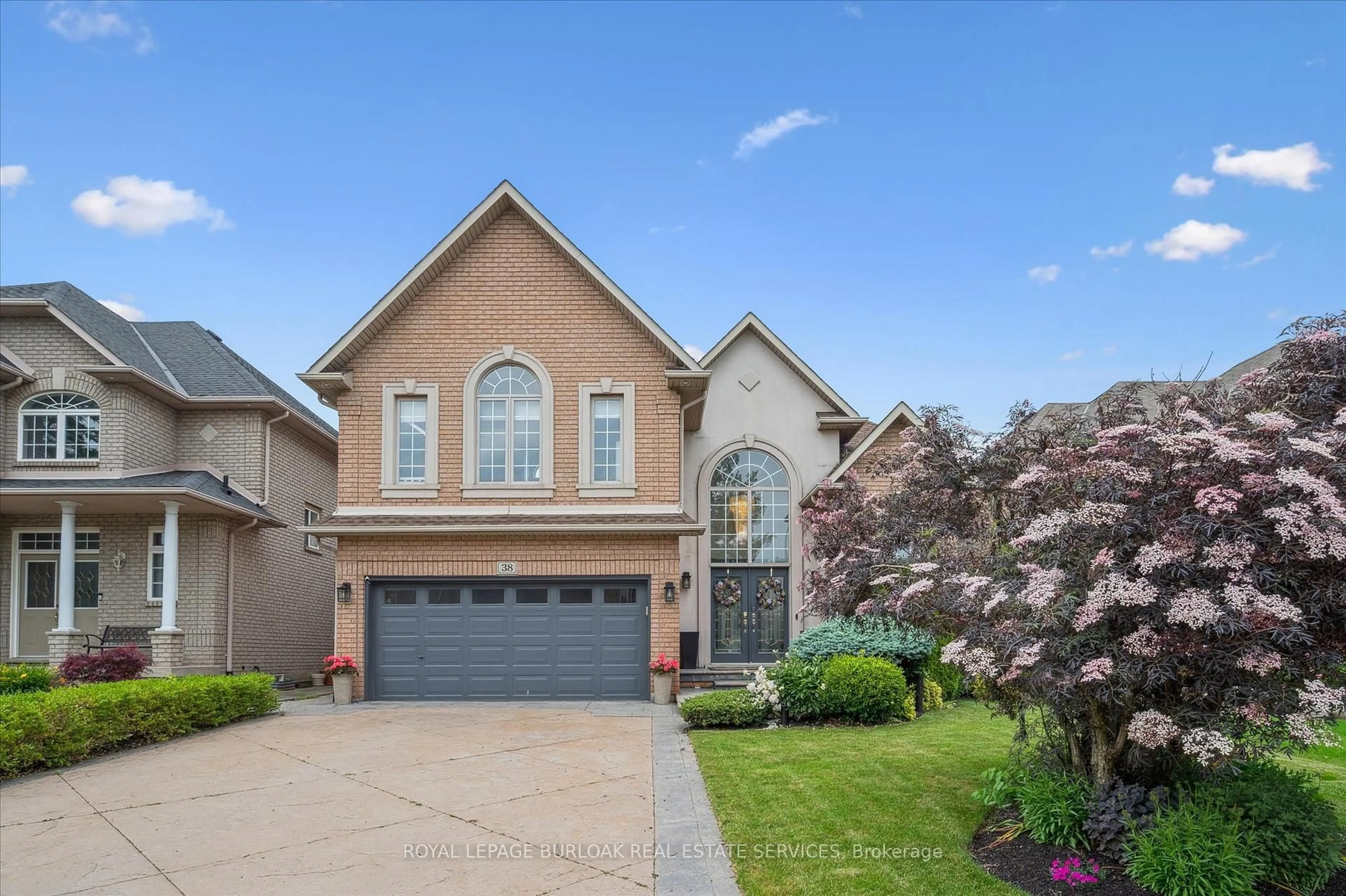 Home with brick exterior material, street for 38 Surrey Dr, Hamilton Ontario L9K 1L9