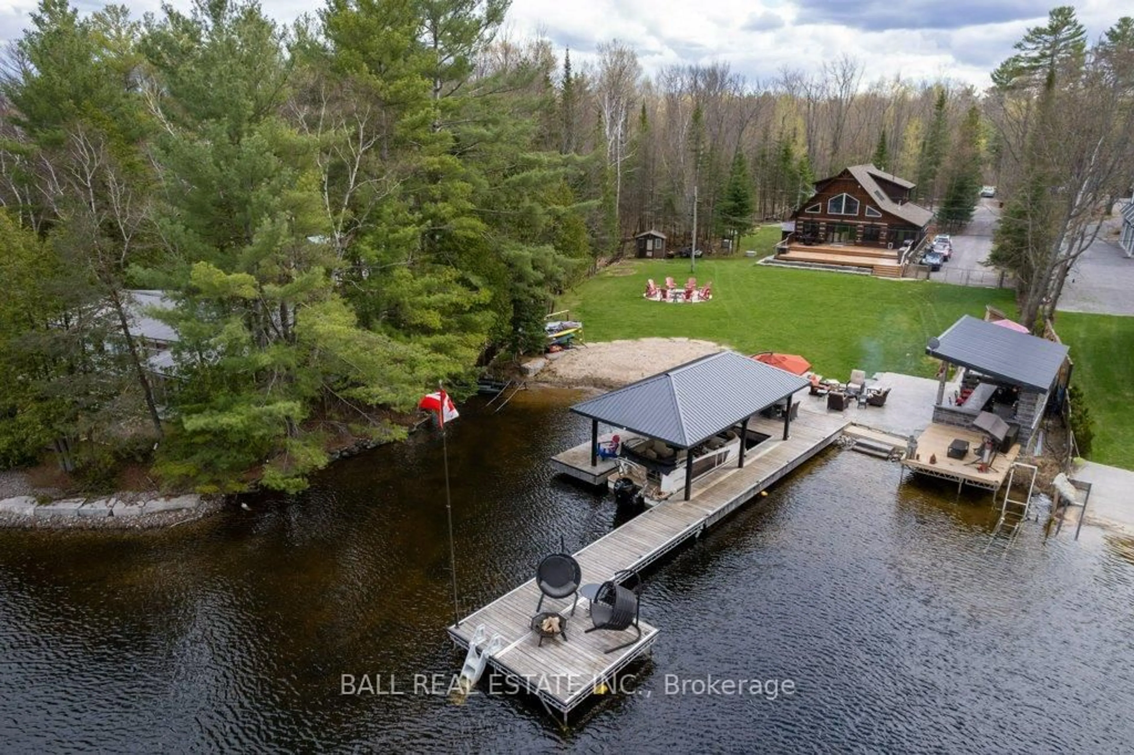 A pic from outside/outdoor area/front of a property/back of a property/a pic from drone, water/lake/river/ocean view for 1726 South Bay Shore Rd, Douro-Dummer Ontario K0L 2H0