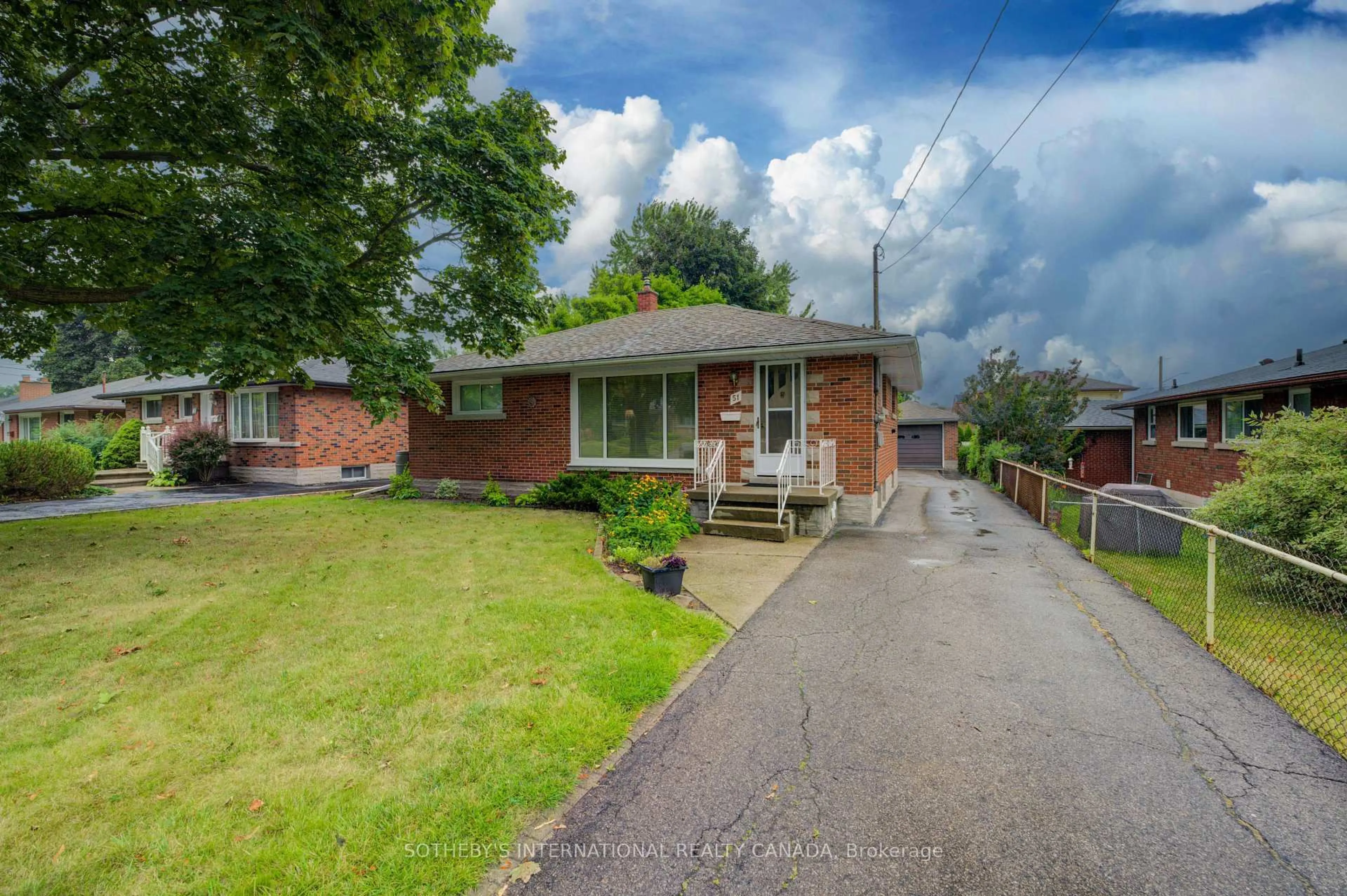 Home with brick exterior material, street for 51 Ottawa Cres, Guelph Ontario N1E 2A7
