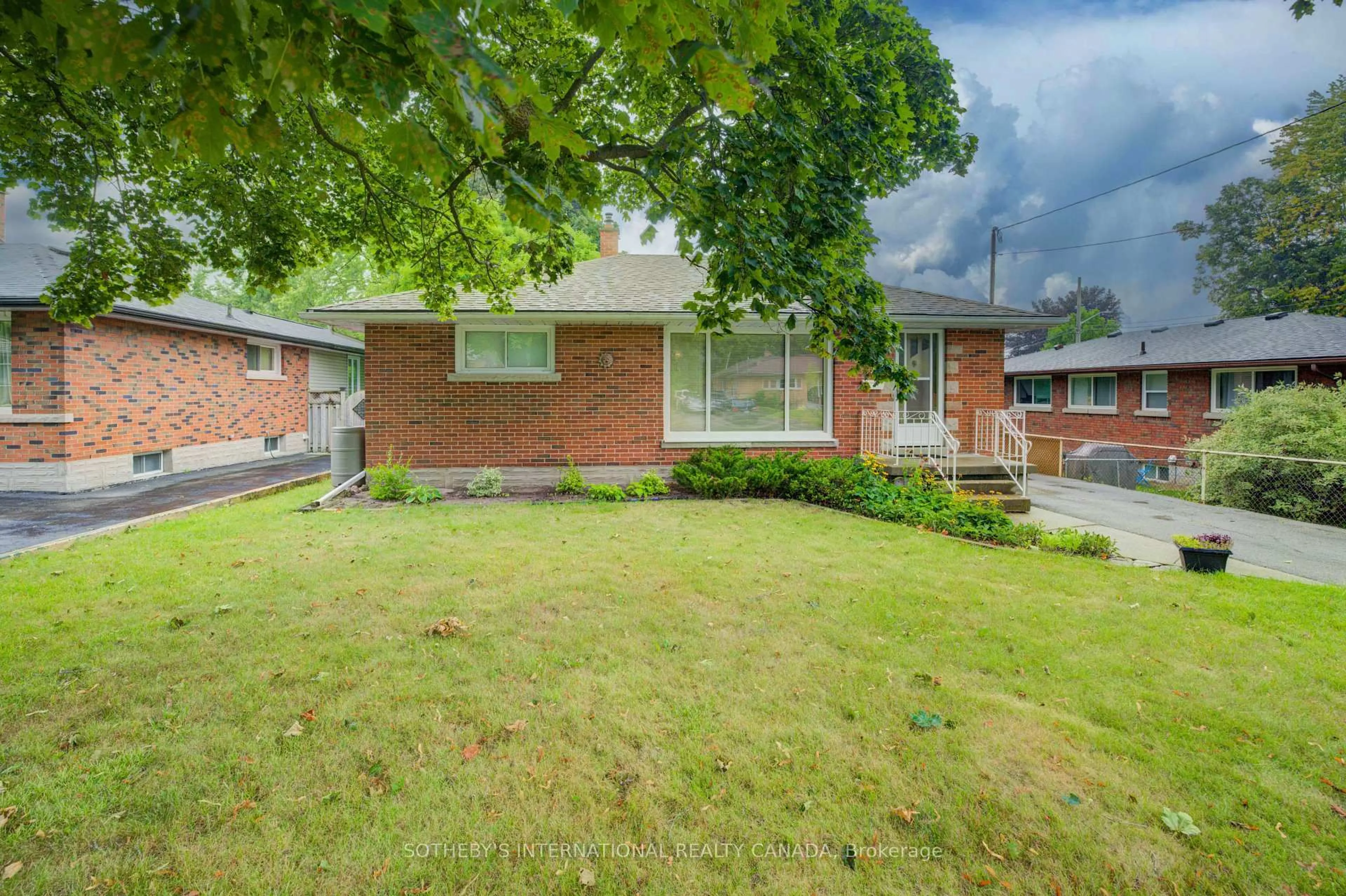 Home with brick exterior material, street for 51 Ottawa Cres, Guelph Ontario N1E 2A7