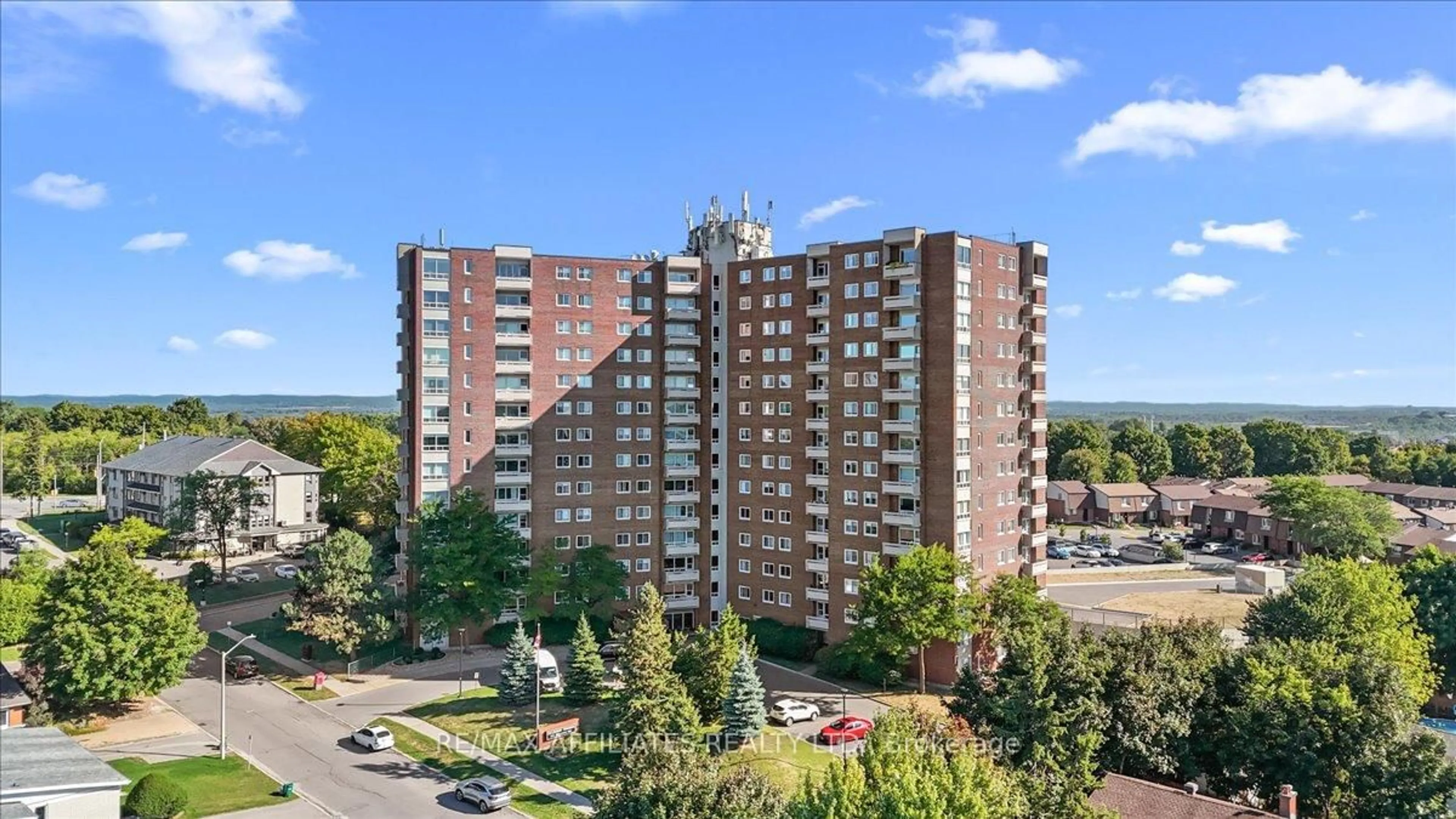 A pic from outside/outdoor area/front of a property/back of a property/a pic from drone, unknown for 915 Elmsmere Rd #113, Ottawa Ontario K1J 8H8