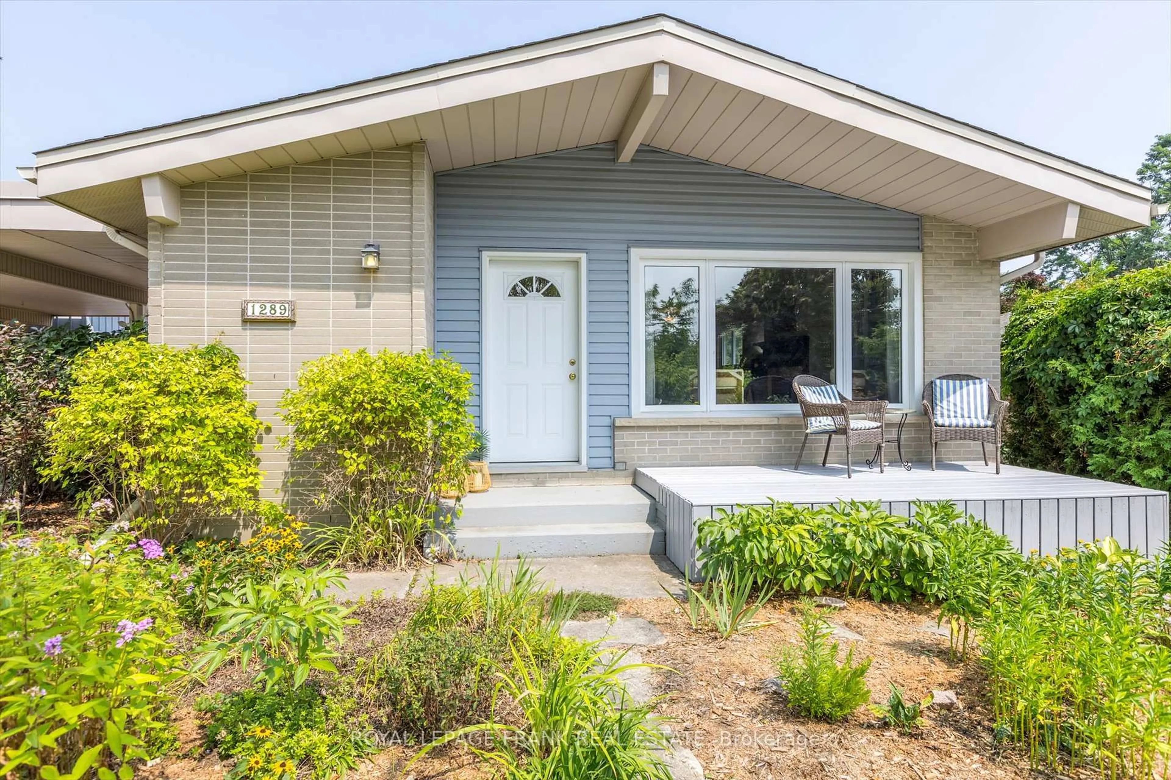 Home with vinyl exterior material, street for 1289 Algonquin Blvd, Peterborough Ontario K9H 6N1