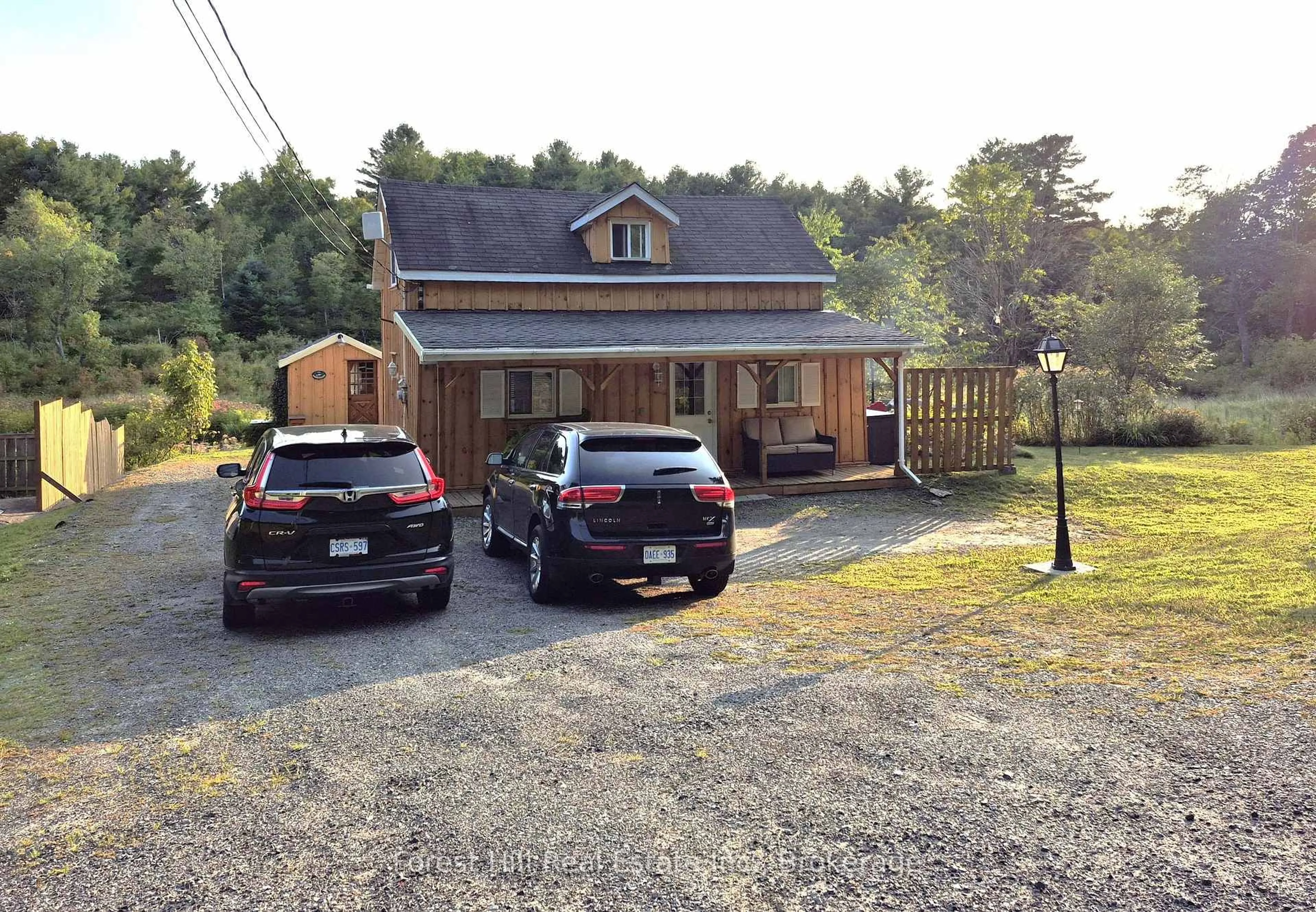 A pic from outside/outdoor area/front of a property/back of a property/a pic from drone, street for 77 James Bay Junction Rd, Seguin Ontario P2A 0B2