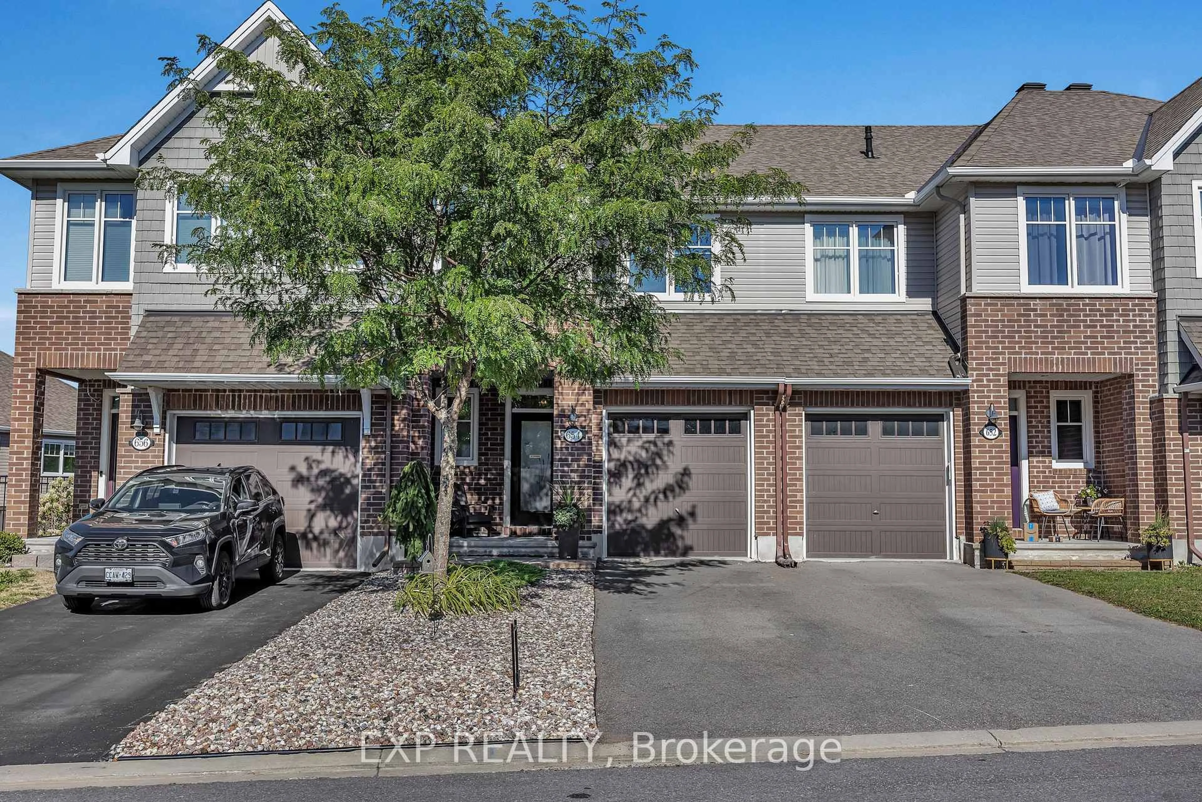 Home with brick exterior material, street for 654 Cartographe St, Ottawa Ontario K4A 1B6