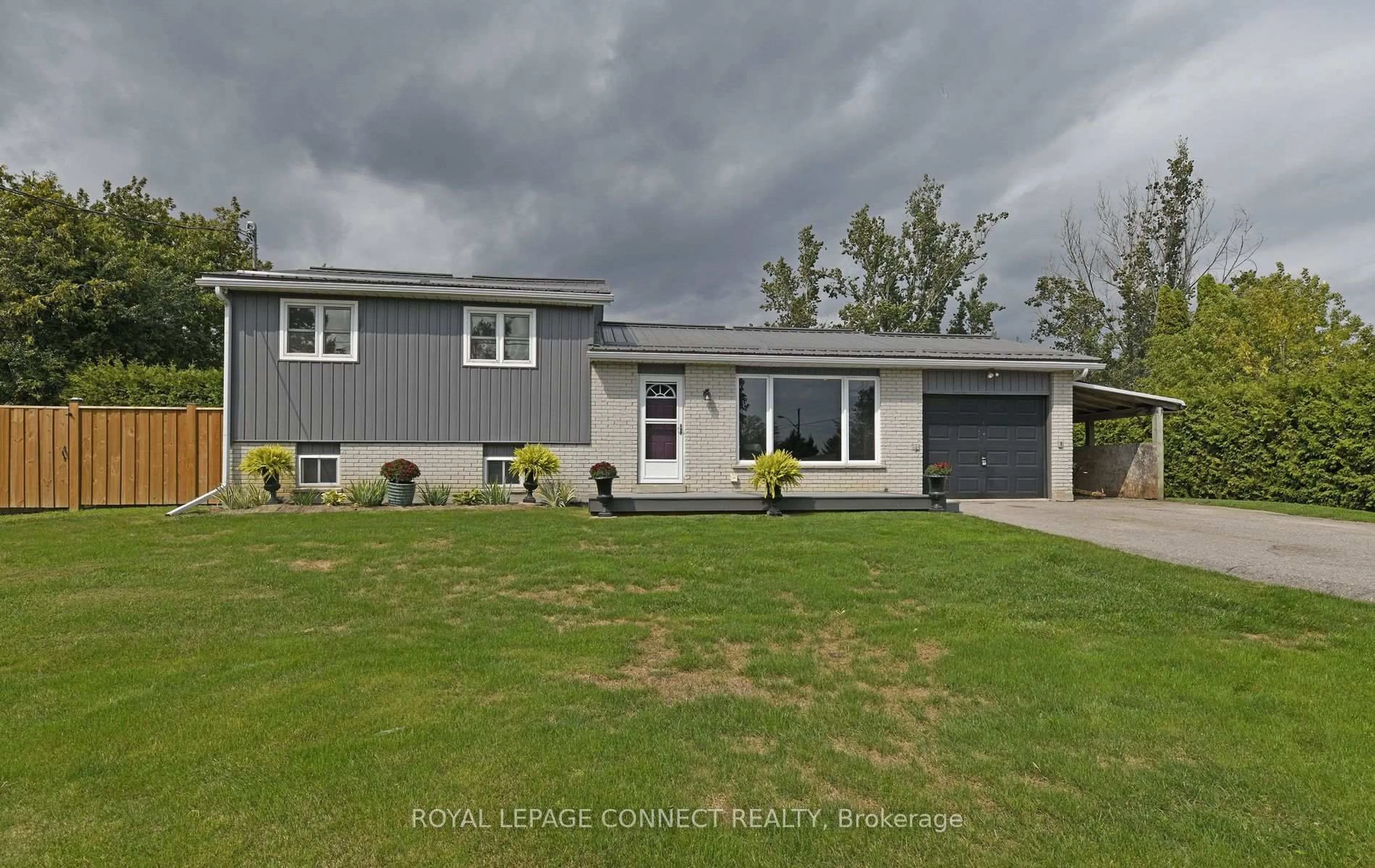 Home with vinyl exterior material, street for 113 Pleasant Point Rd, Kawartha Lakes Ontario K0M 2C0