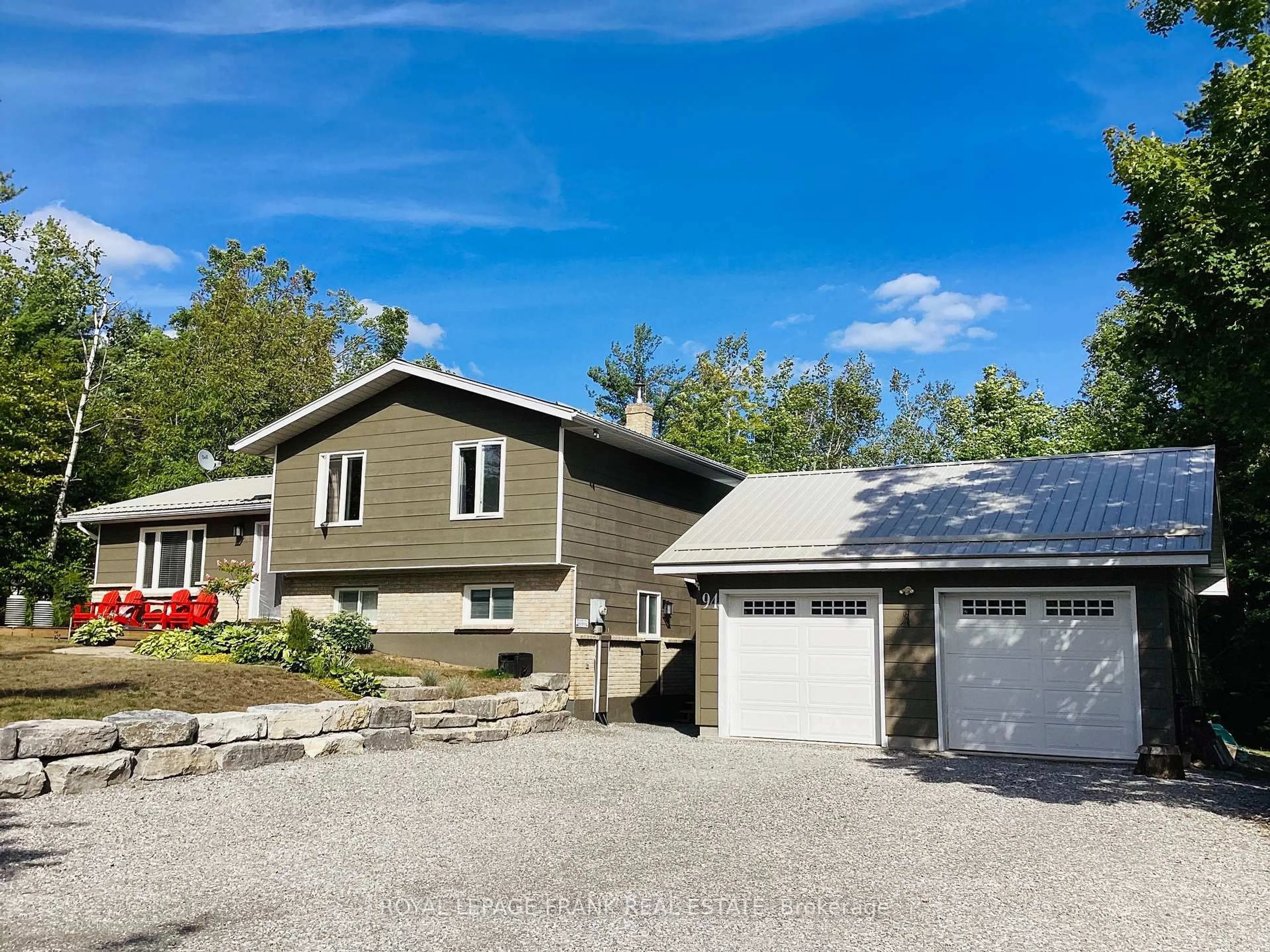 Home with vinyl exterior material, street for 94 County Road 36, Trent Lakes Ontario K0M 1A0