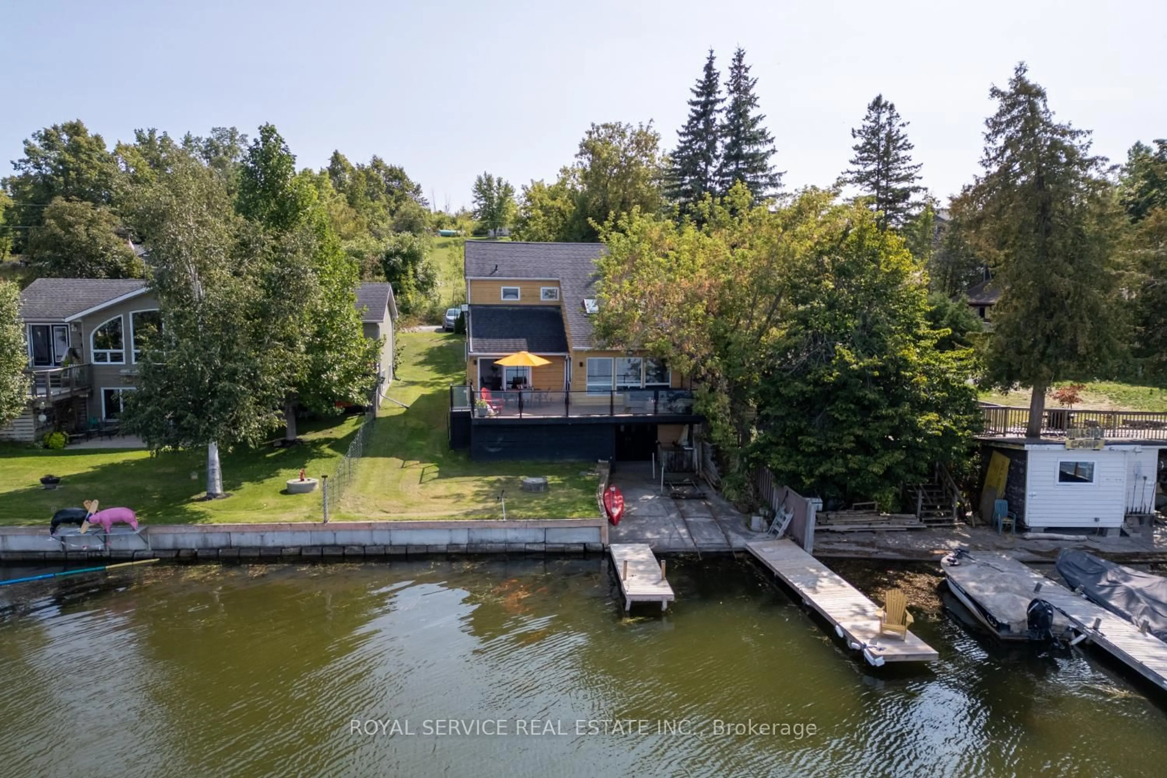 A pic from outside/outdoor area/front of a property/back of a property/a pic from drone, water/lake/river/ocean view for 6108 Curtis Point Rd #12, Alnwick/Haldimand Ontario K0K 2X0