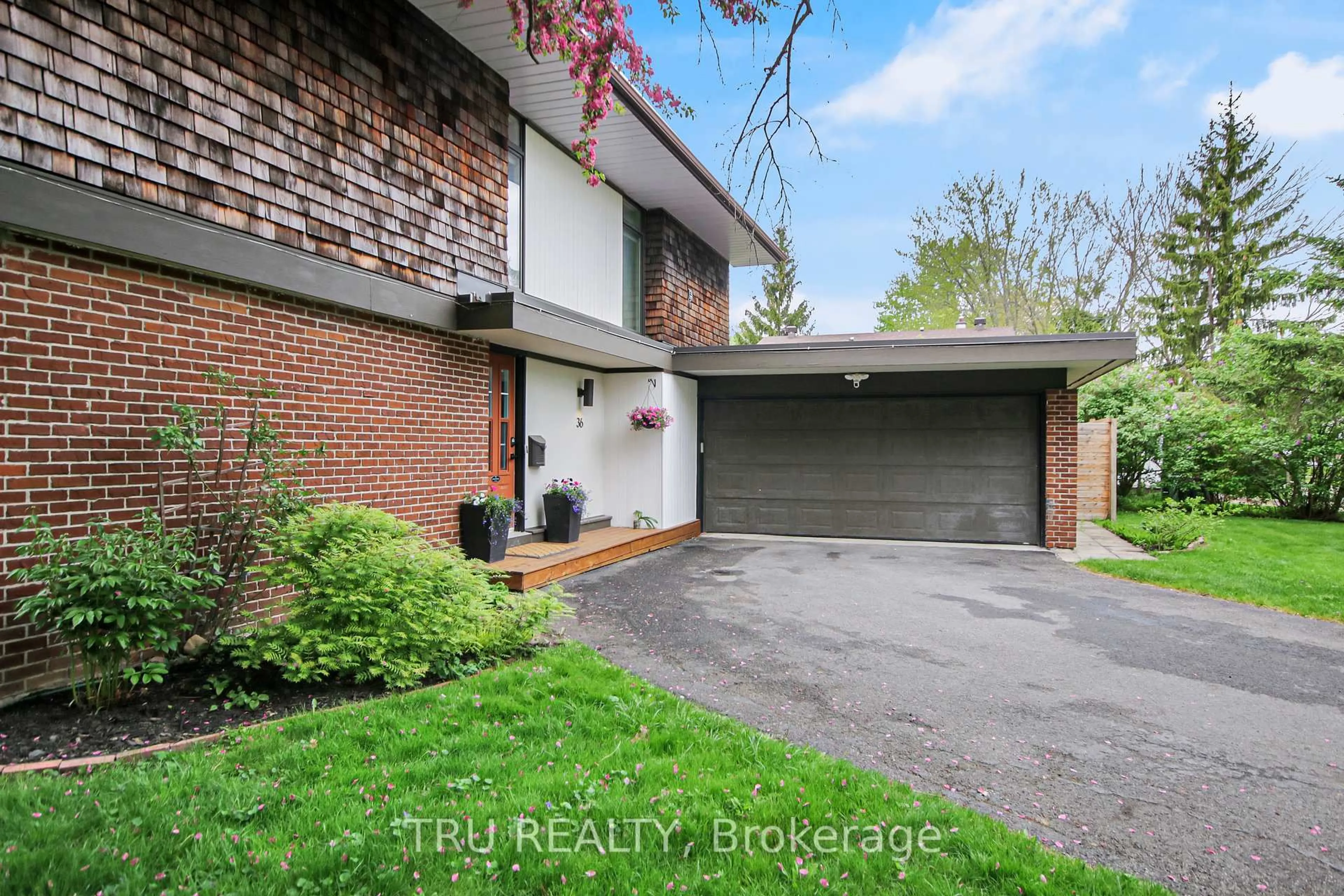 Home with brick exterior material, street for 36 Varley Dr, Kanata Ontario K2K 1G2