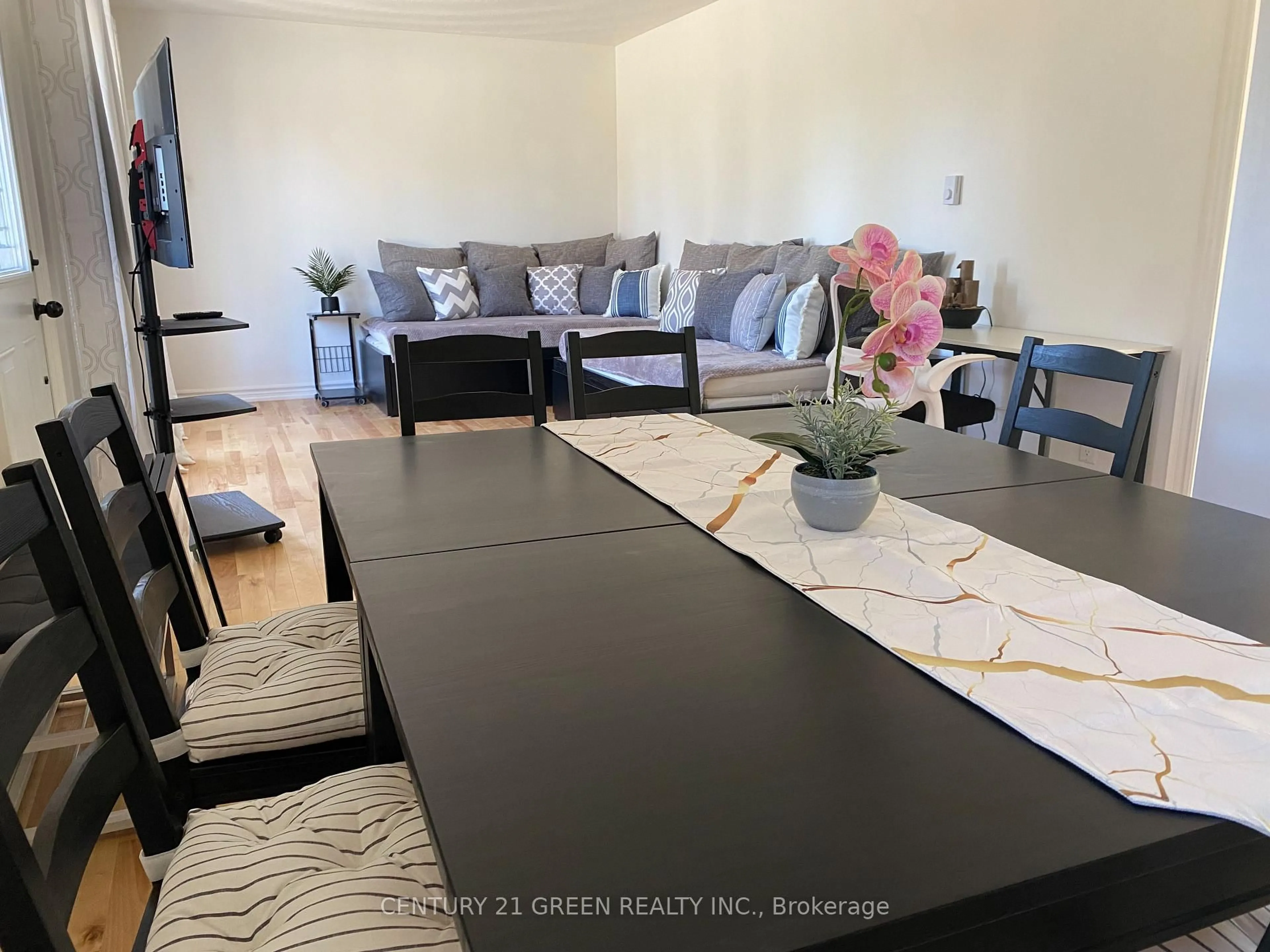 Living room with furniture, wood/laminate floor for 486 County Rd 40 #Unit 6 & 8, Trenton Ontario K8V 5P7