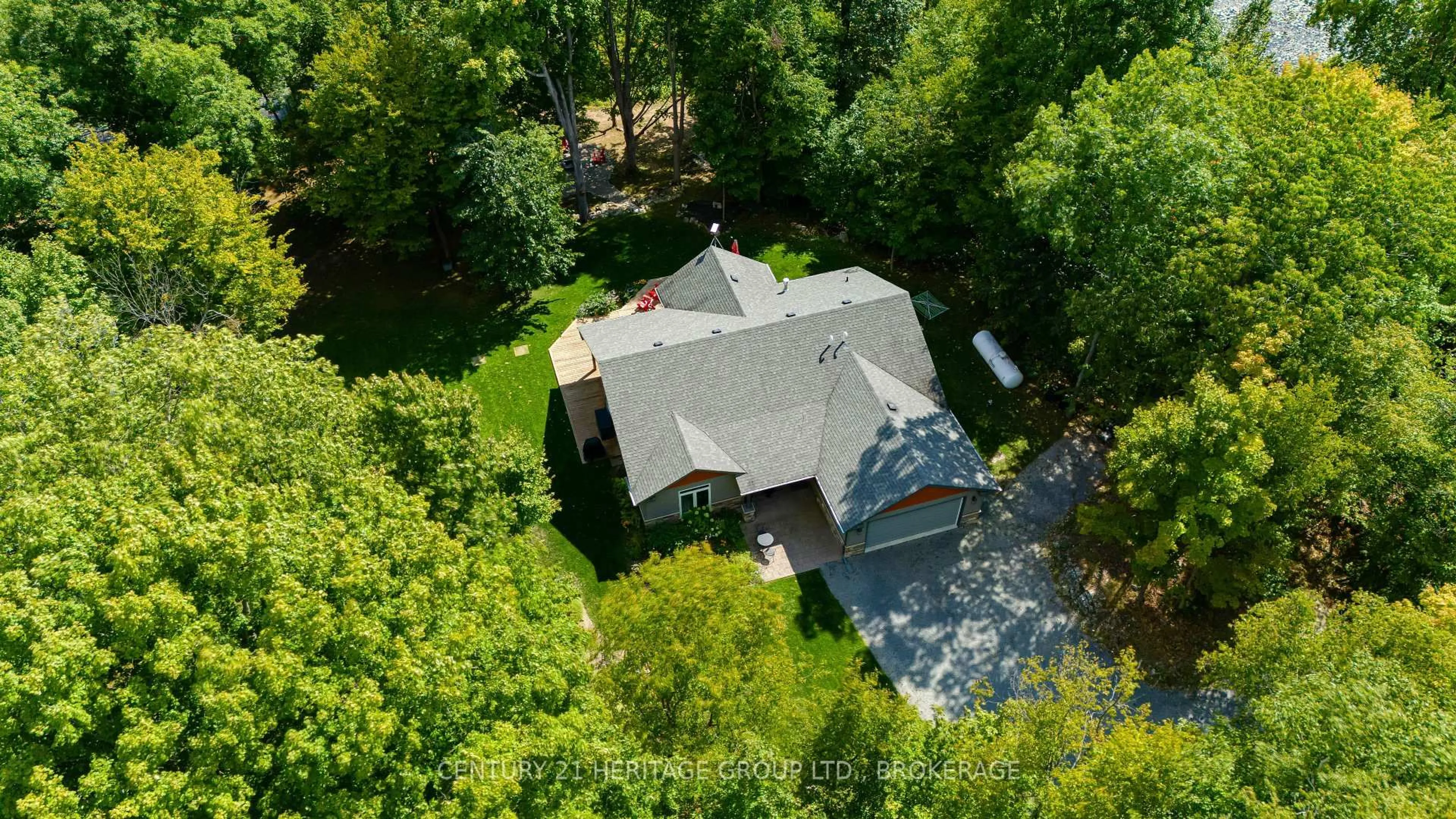 A pic from outside/outdoor area/front of a property/back of a property/a pic from drone, forest/trees view for 627 Stafford Lane, Seeley's Bay Ontario K0H 2N0