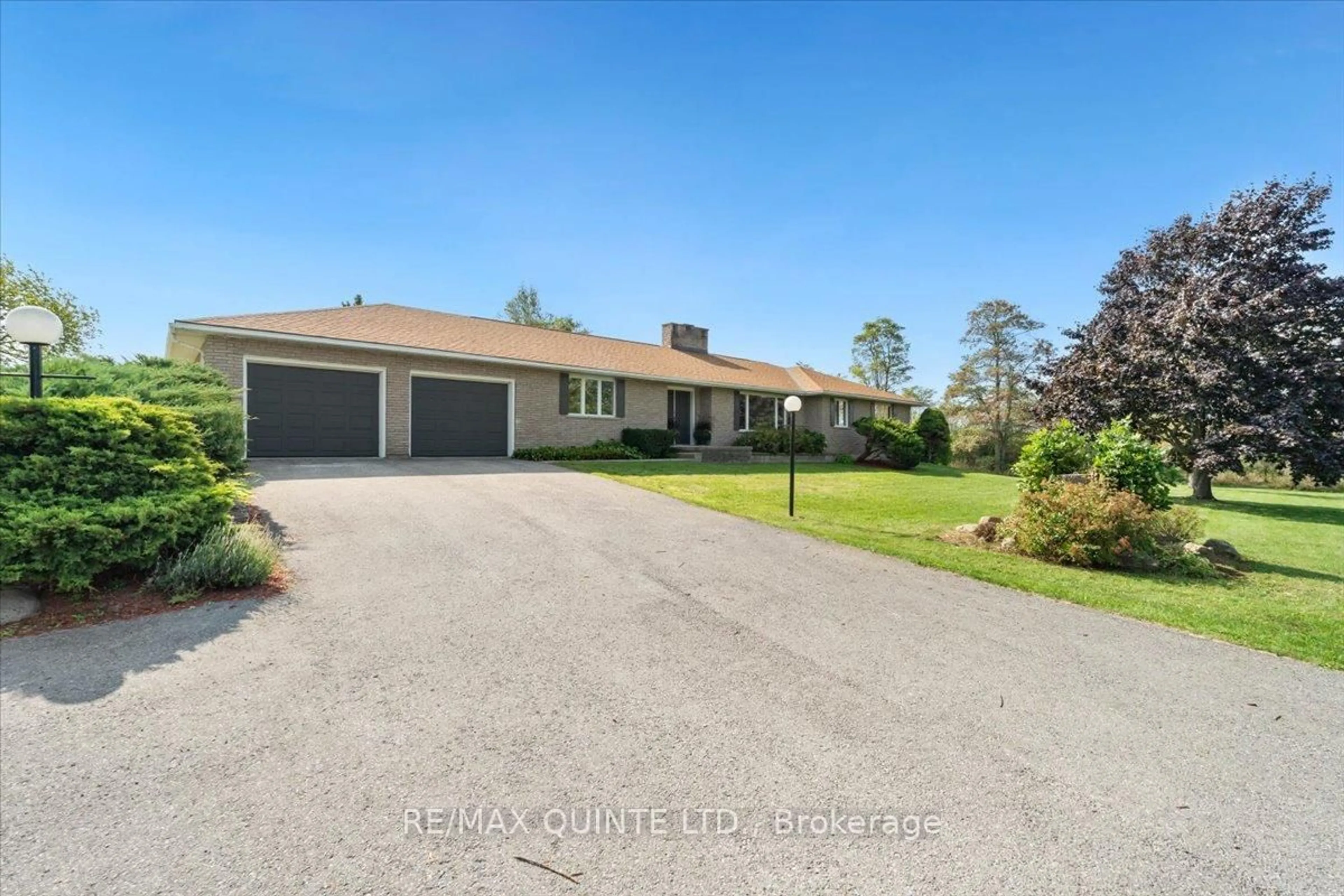 A pic from outside/outdoor area/front of a property/back of a property/a pic from drone, street for 737 County Road 18 Rd, Prince Edward County Ontario K0K 1P0