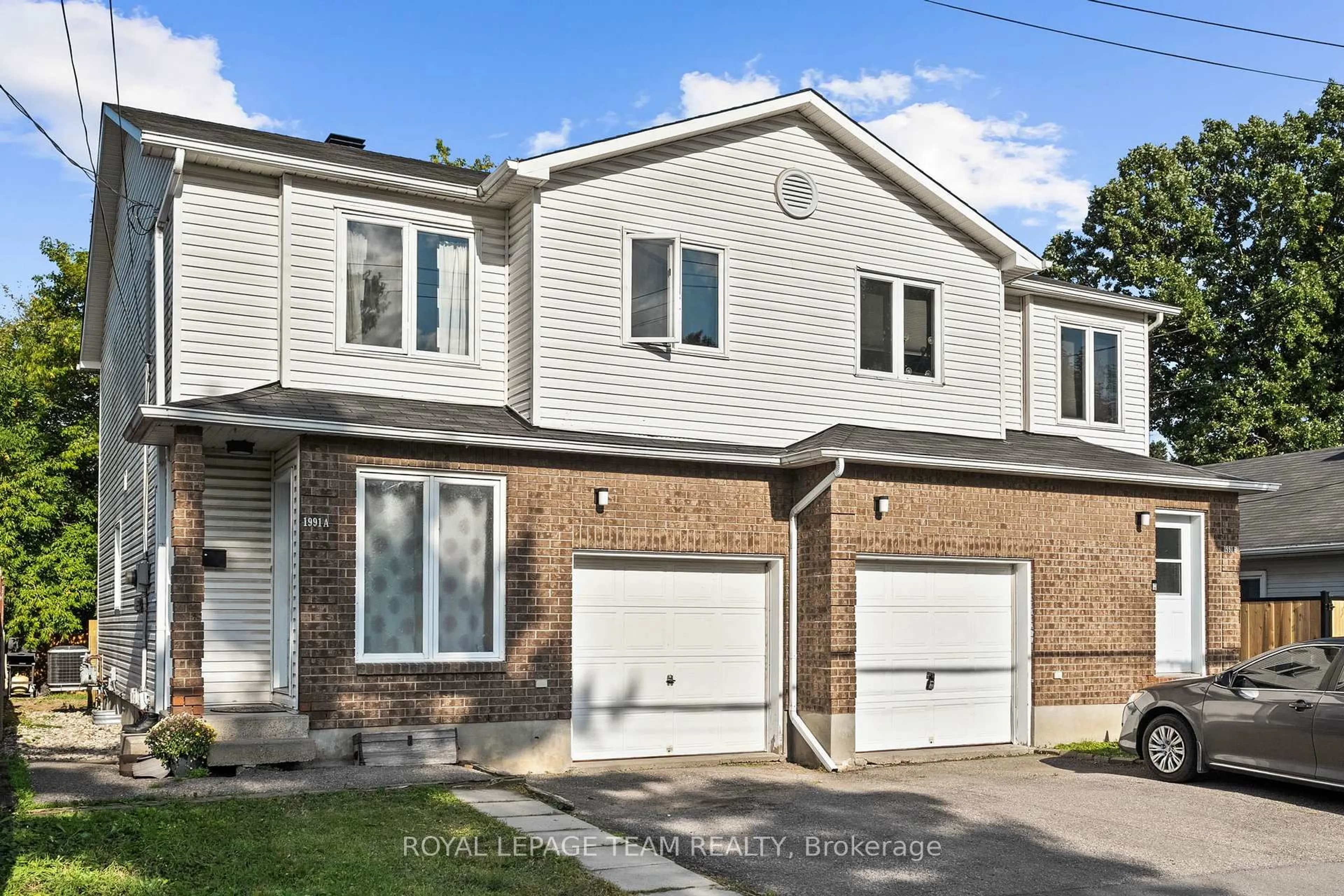 Home with brick exterior material, street for 1991 Banff Ave, Ottawa Ontario K1V 7X6
