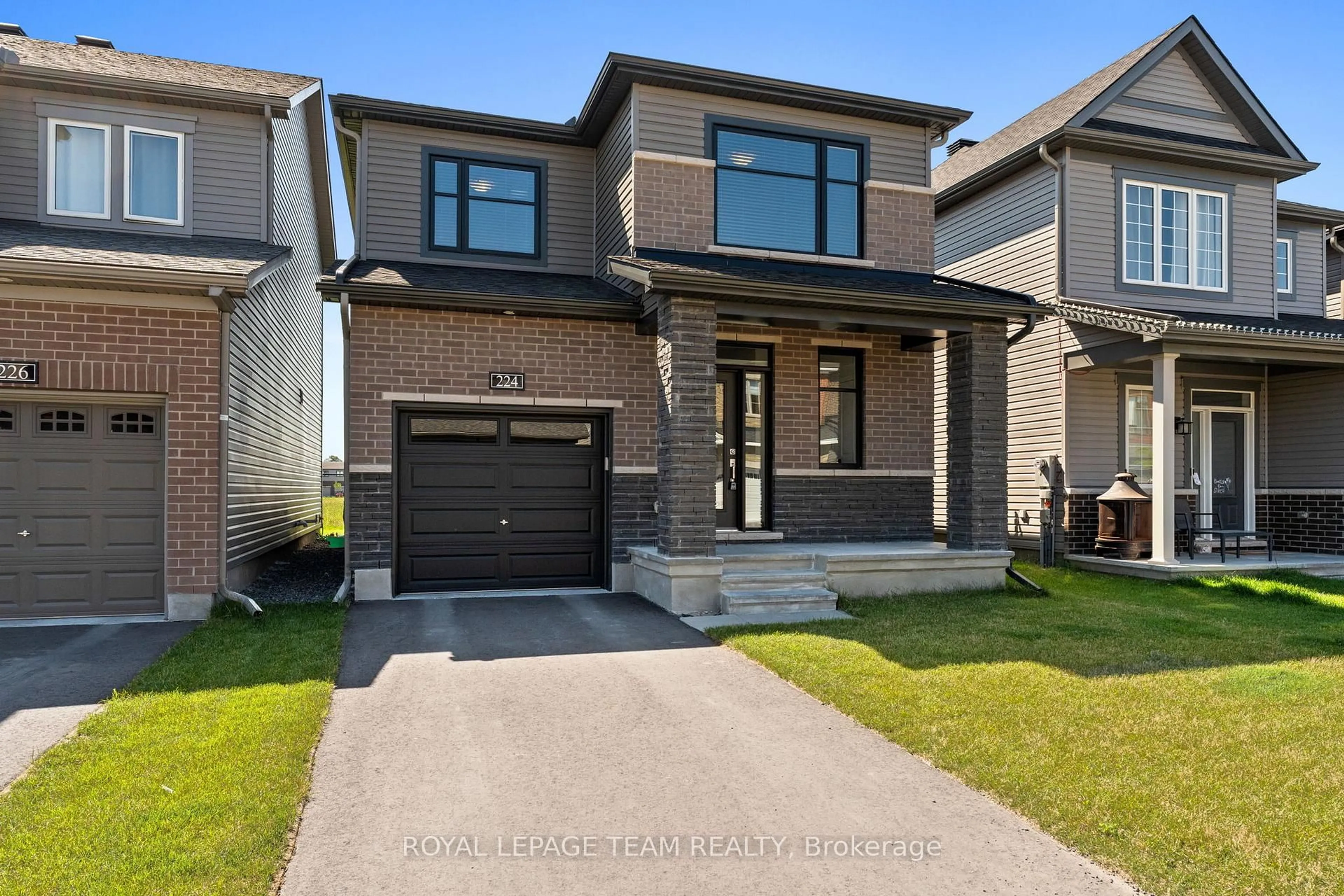 Home with brick exterior material, street for 224 ELSIE MACGILL Walk, Ottawa Ontario K2W 0L4