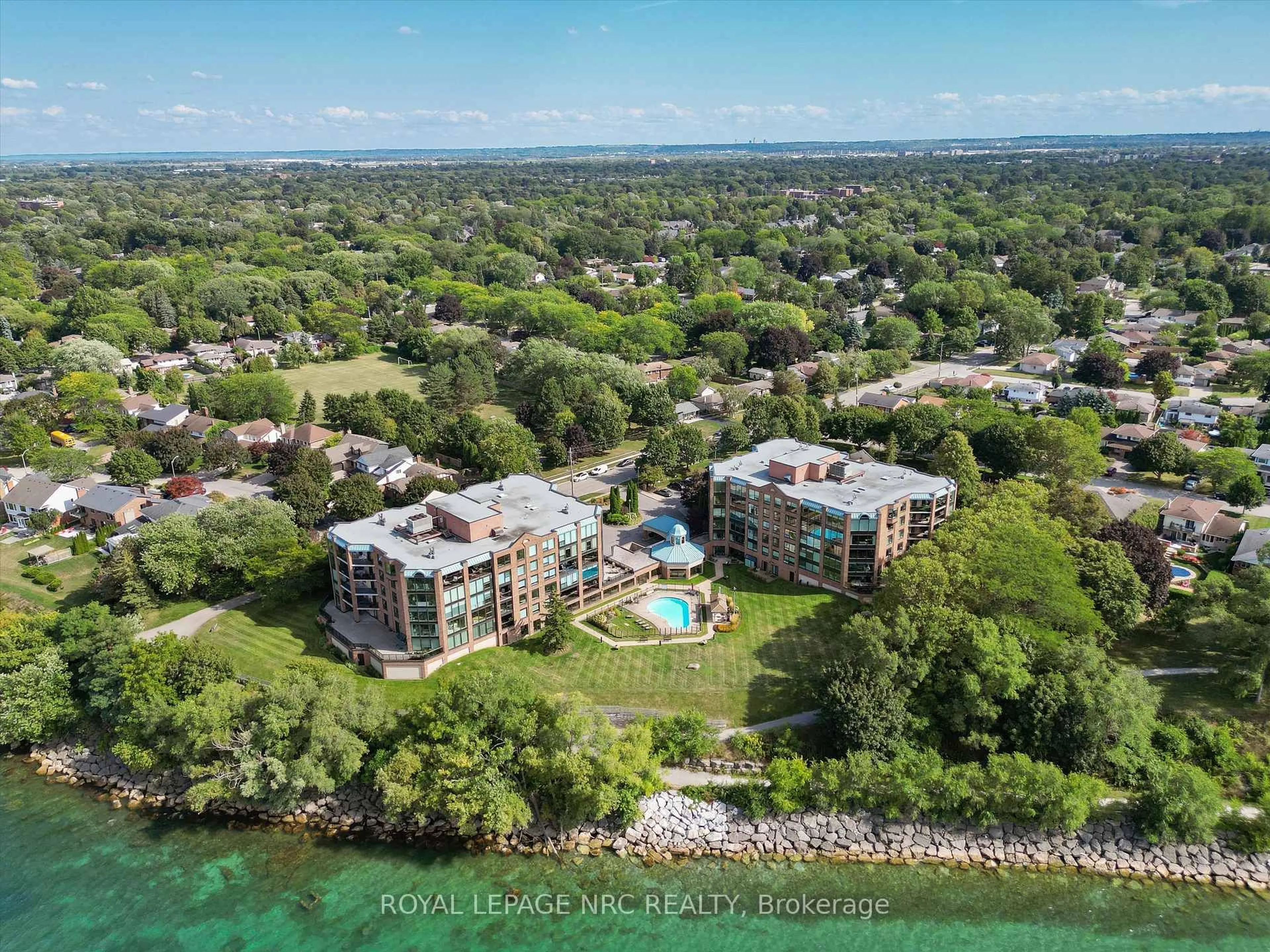 A pic from outside/outdoor area/front of a property/back of a property/a pic from drone, water/lake/river/ocean view for 701 Geneva St #2204, St. Catharines Ontario L2N 7H9