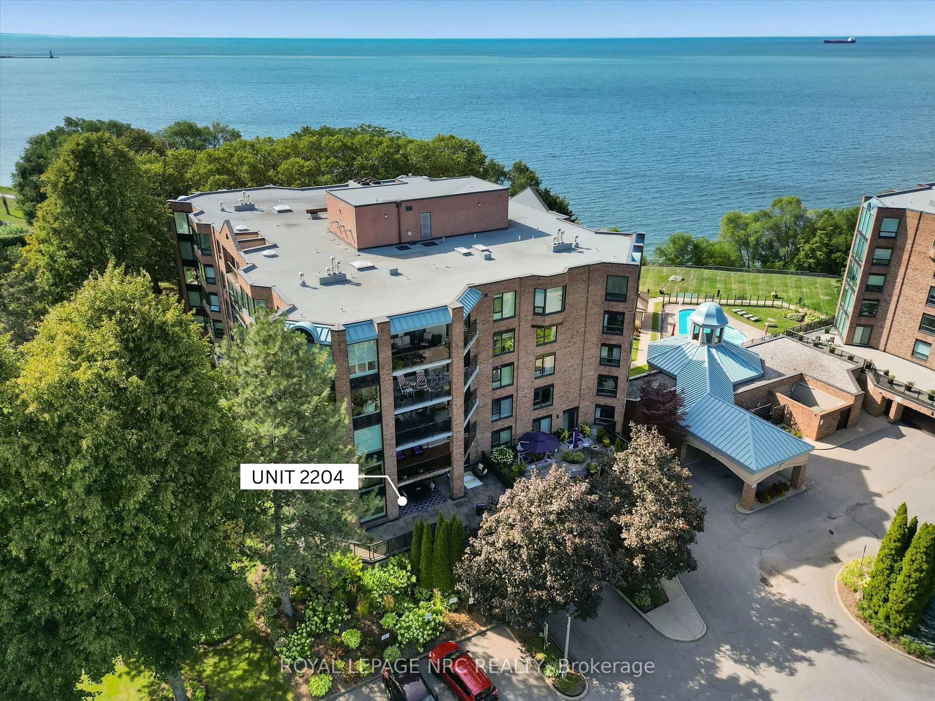 A pic from outside/outdoor area/front of a property/back of a property/a pic from drone, water/lake/river/ocean view for 701 Geneva St #2204, St. Catharines Ontario L2N 7H9