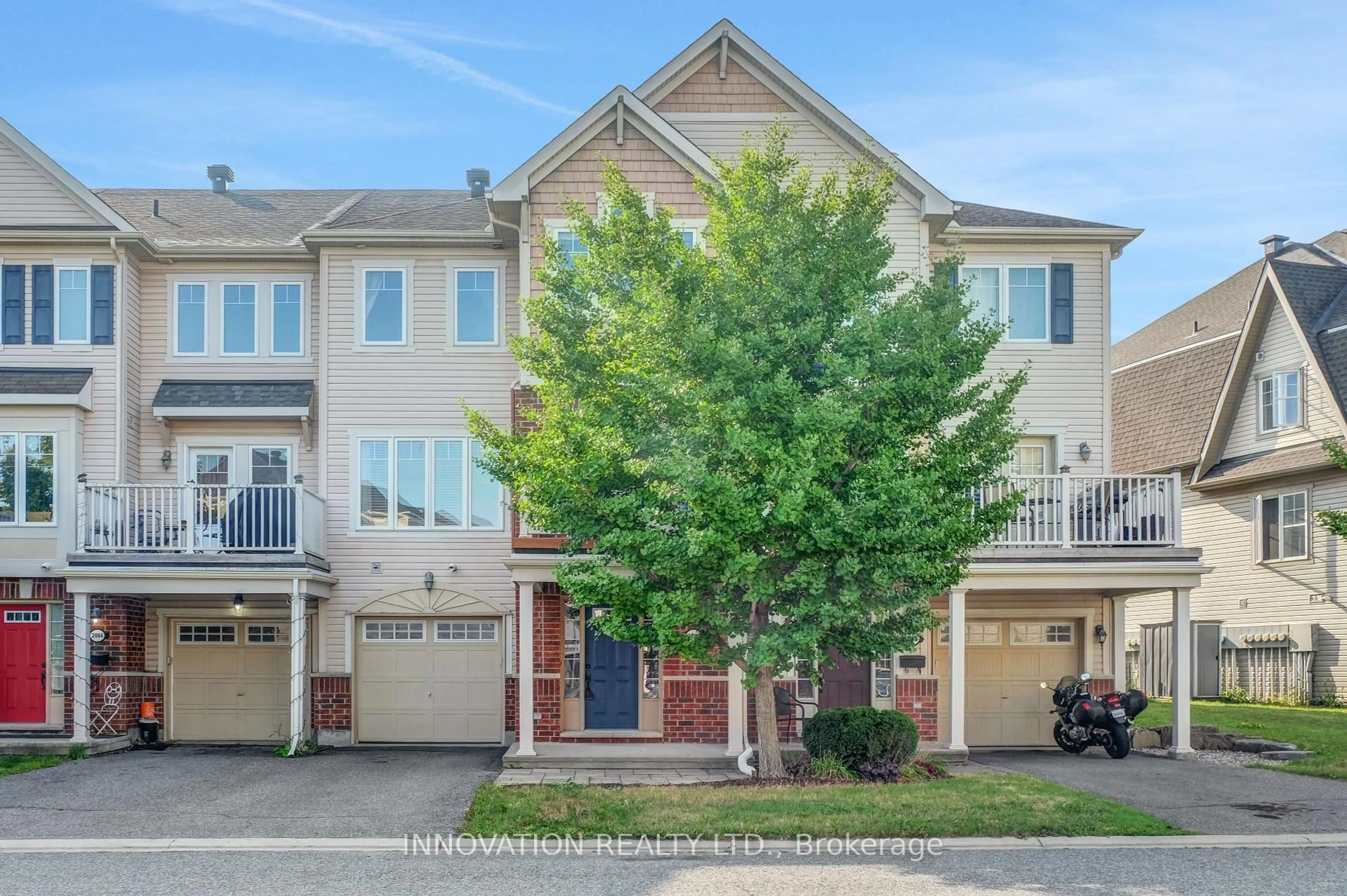 A pic from outside/outdoor area/front of a property/back of a property/a pic from drone, street for 2082 Madrid Ave, Ottawa Ontario K2J 0K4