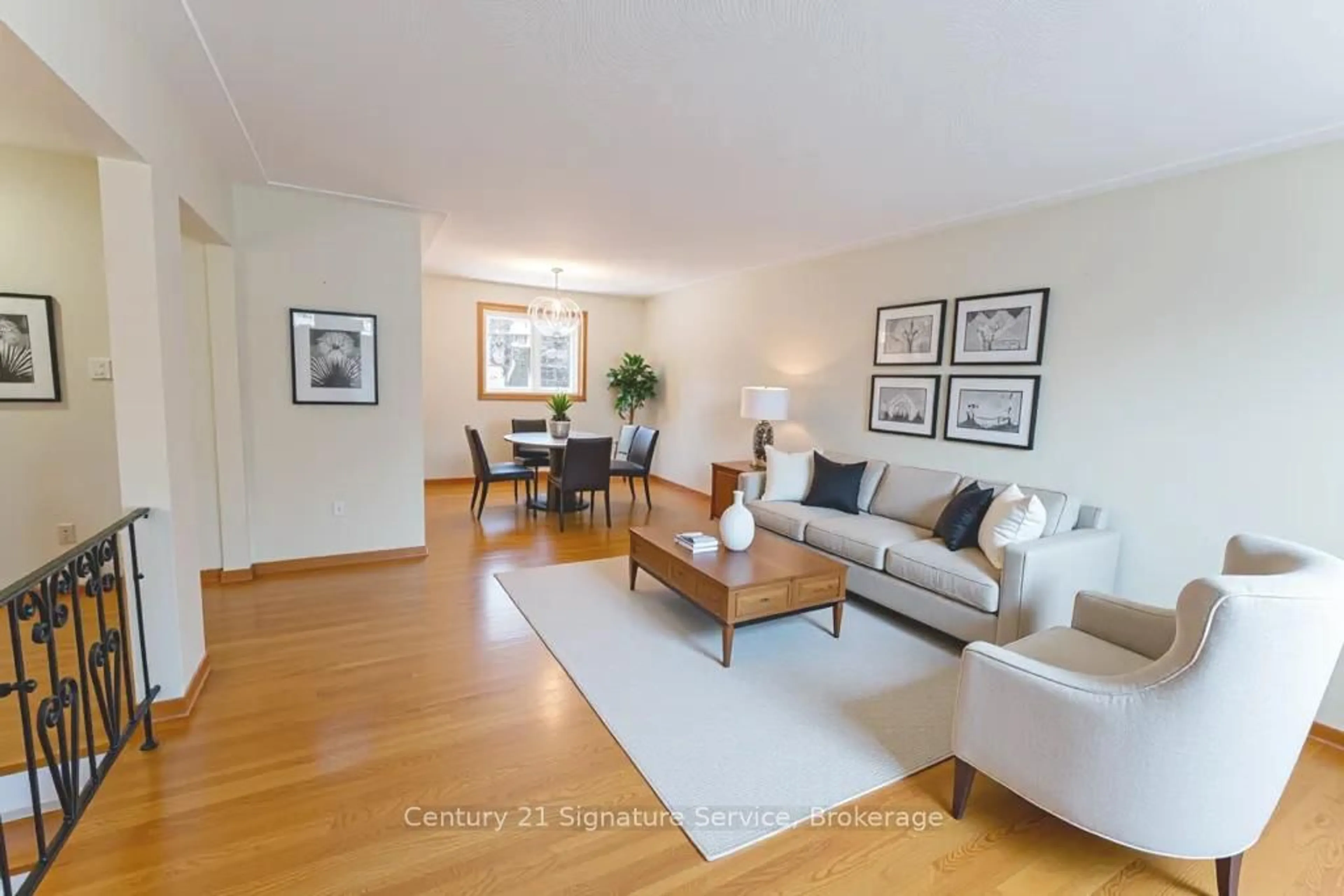 Living room with furniture, wood/laminate floor for 15 Joy Crt, Hamilton Ontario L8K 5R7