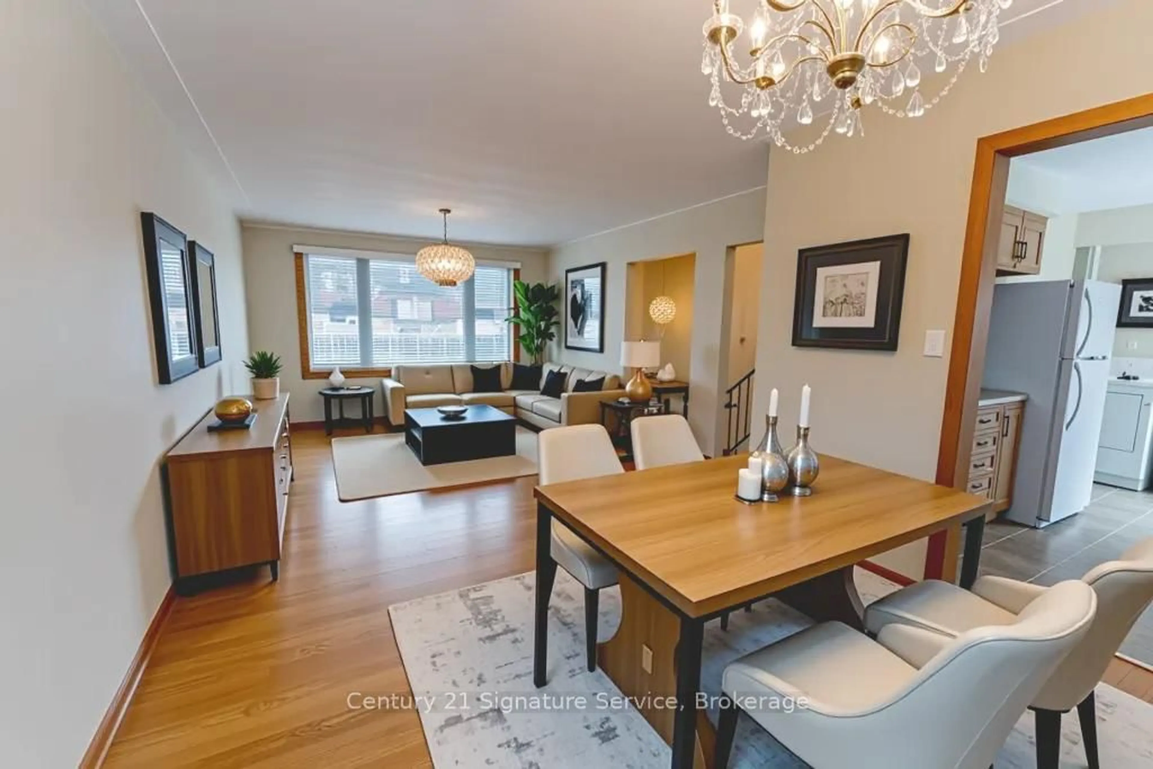 Living room with furniture, wood/laminate floor for 15 Joy Crt, Hamilton Ontario L8K 5R7