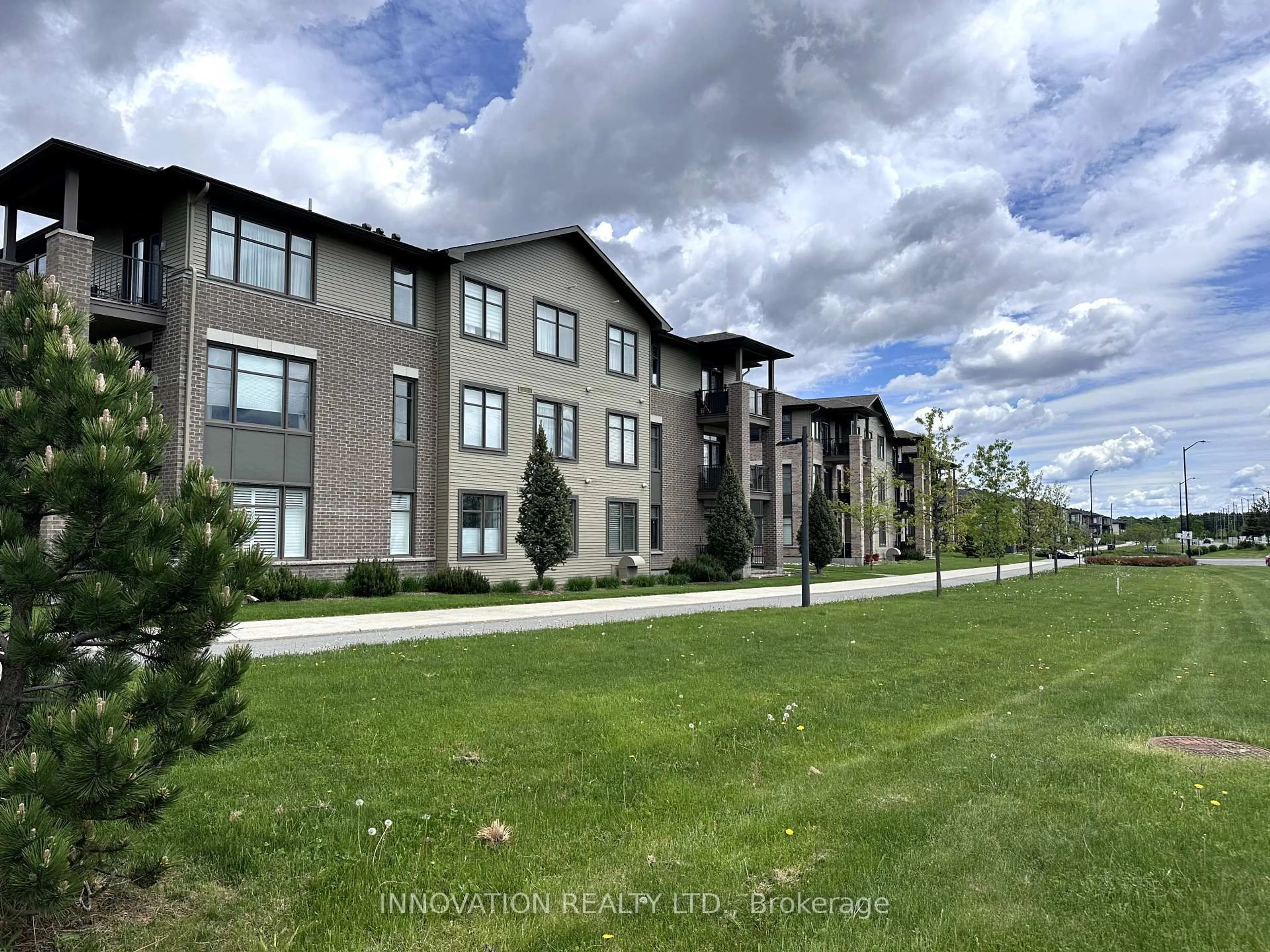 A pic from outside/outdoor area/front of a property/back of a property/a pic from drone, unknown for 320 Jatoba #103, Ottawa Ontario K2V 0E7