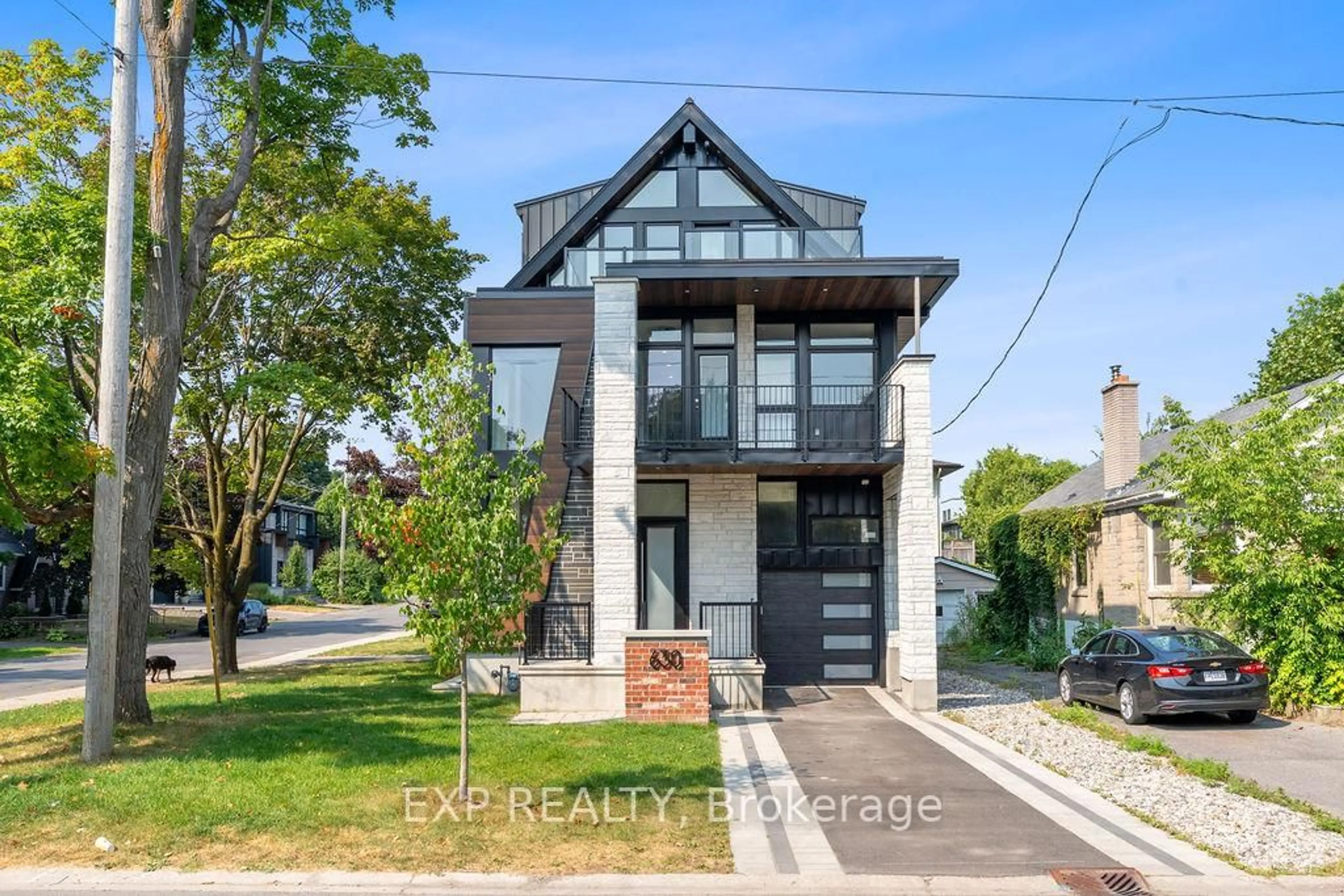 Home with brick exterior material, street for 630 Tweedsmuir Ave, Ottawa Ontario K1Z 5P5