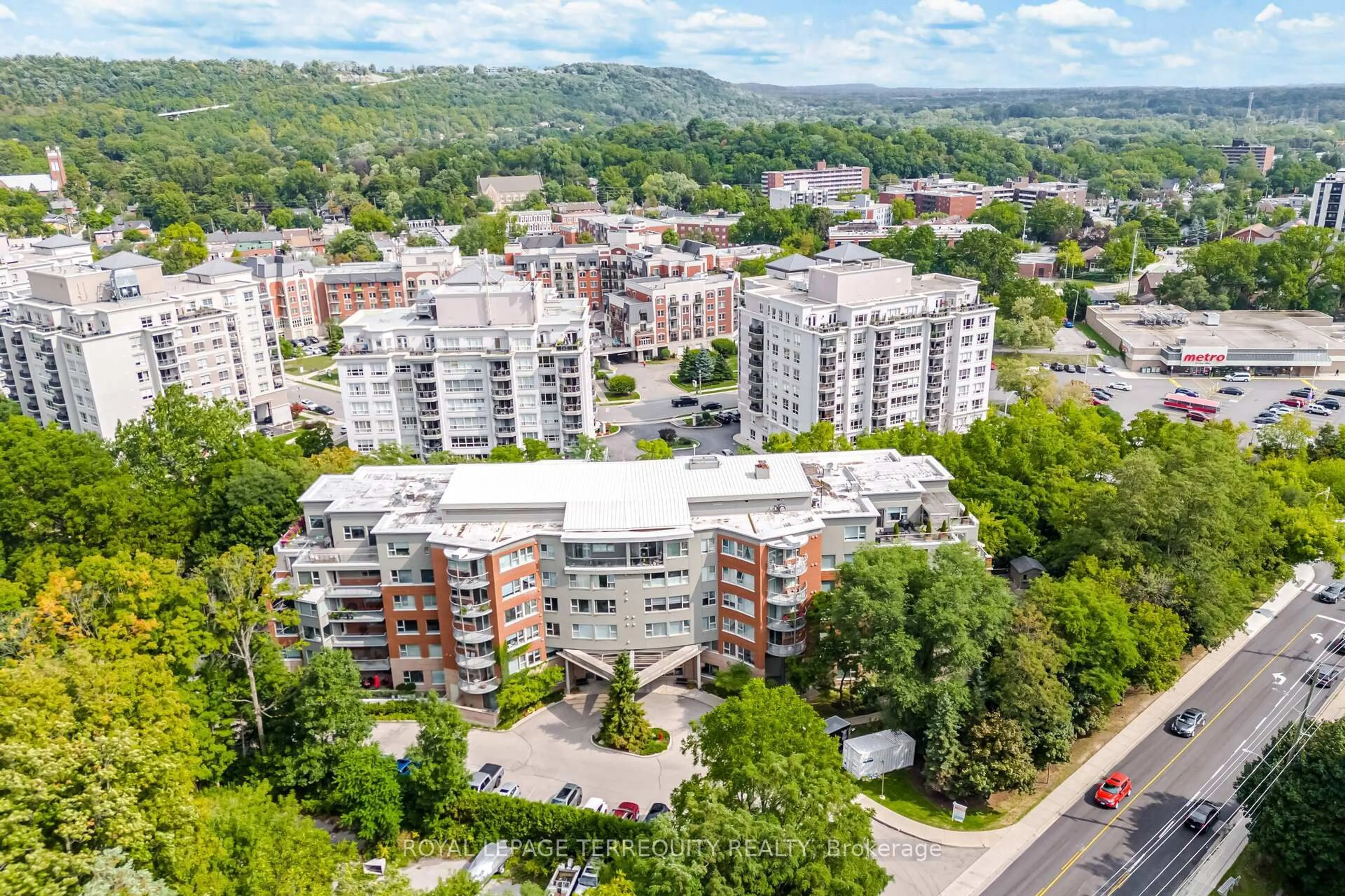 A pic from outside/outdoor area/front of a property/back of a property/a pic from drone, city buildings view from balcony for 77 GOVERNORS Rd #204, Hamilton Ontario L9H 7N8