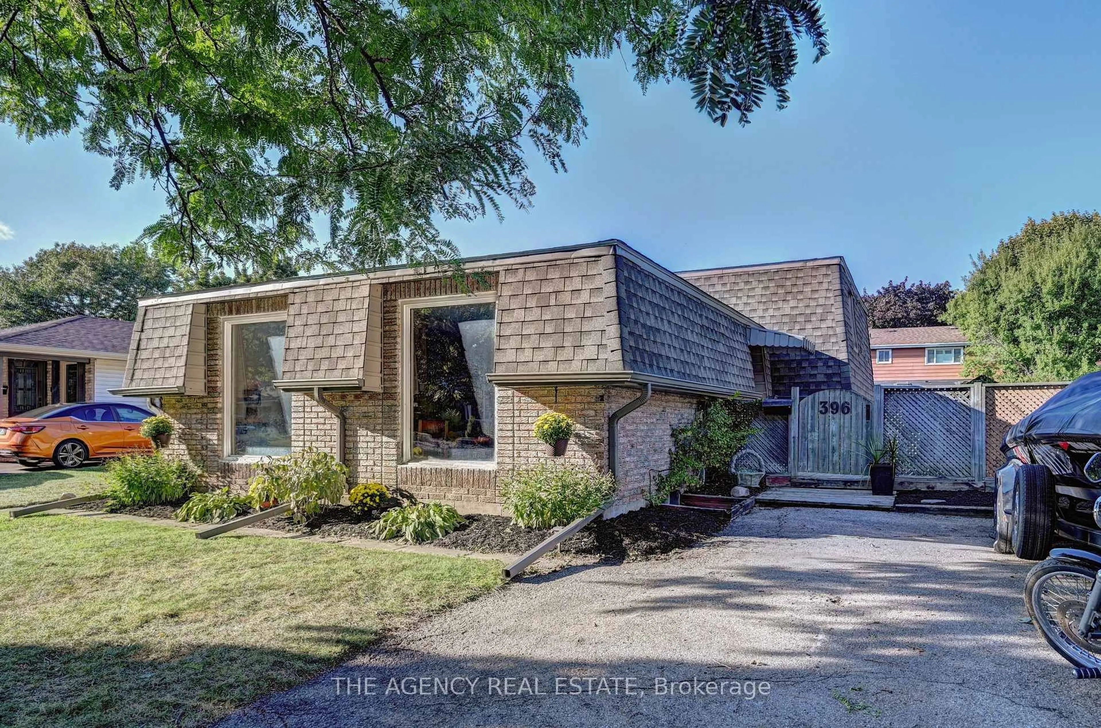 Home with brick exterior material, street for 396 Dunvegan Dr, Waterloo Ontario N2K 2C7