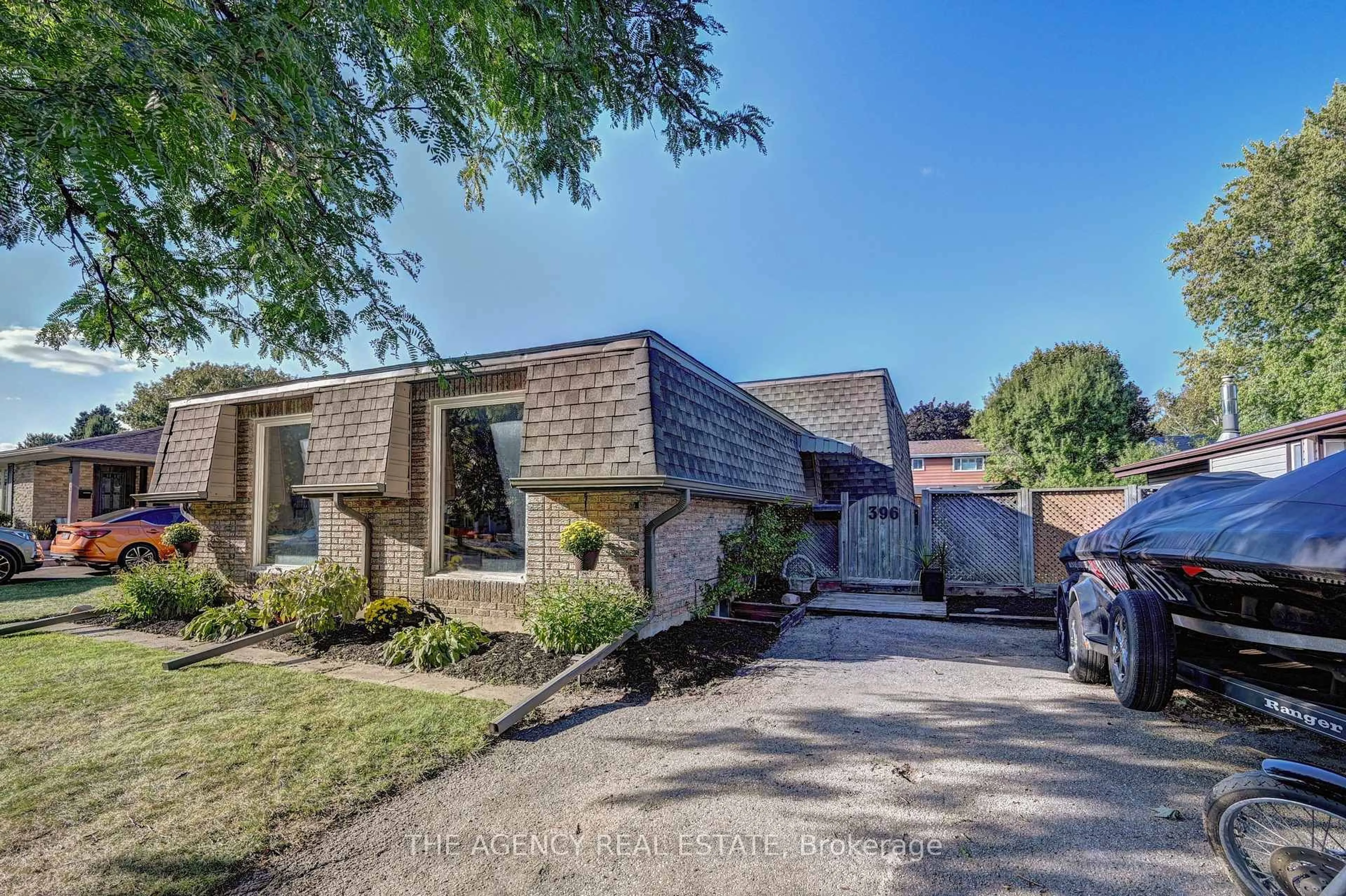 Home with brick exterior material, street for 396 Dunvegan Dr, Waterloo Ontario N2K 2C7