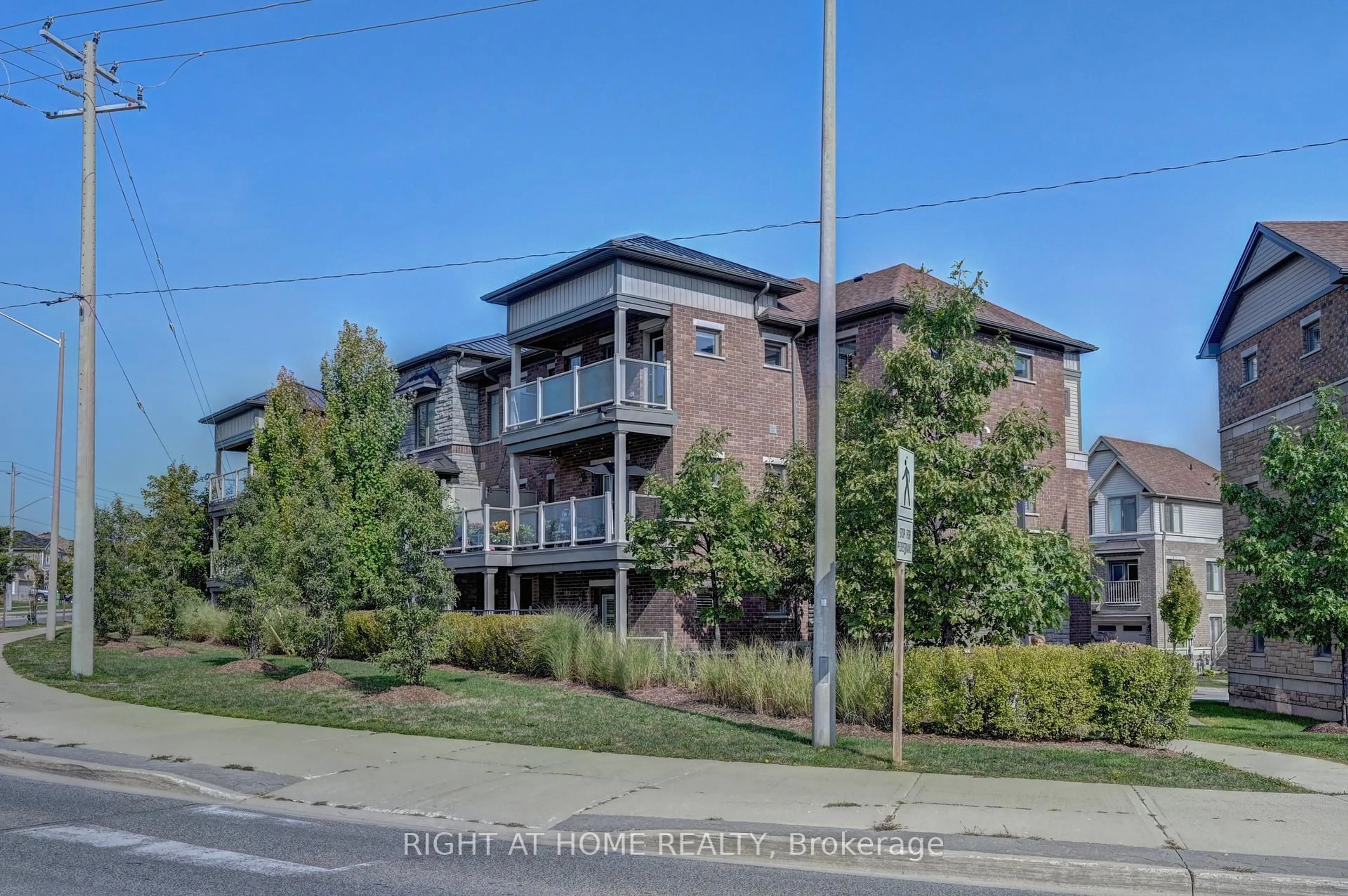 A pic from outside/outdoor area/front of a property/back of a property/a pic from drone, street for 1102 Fairway Rd #B, Kitchener Ontario N2A 0J3