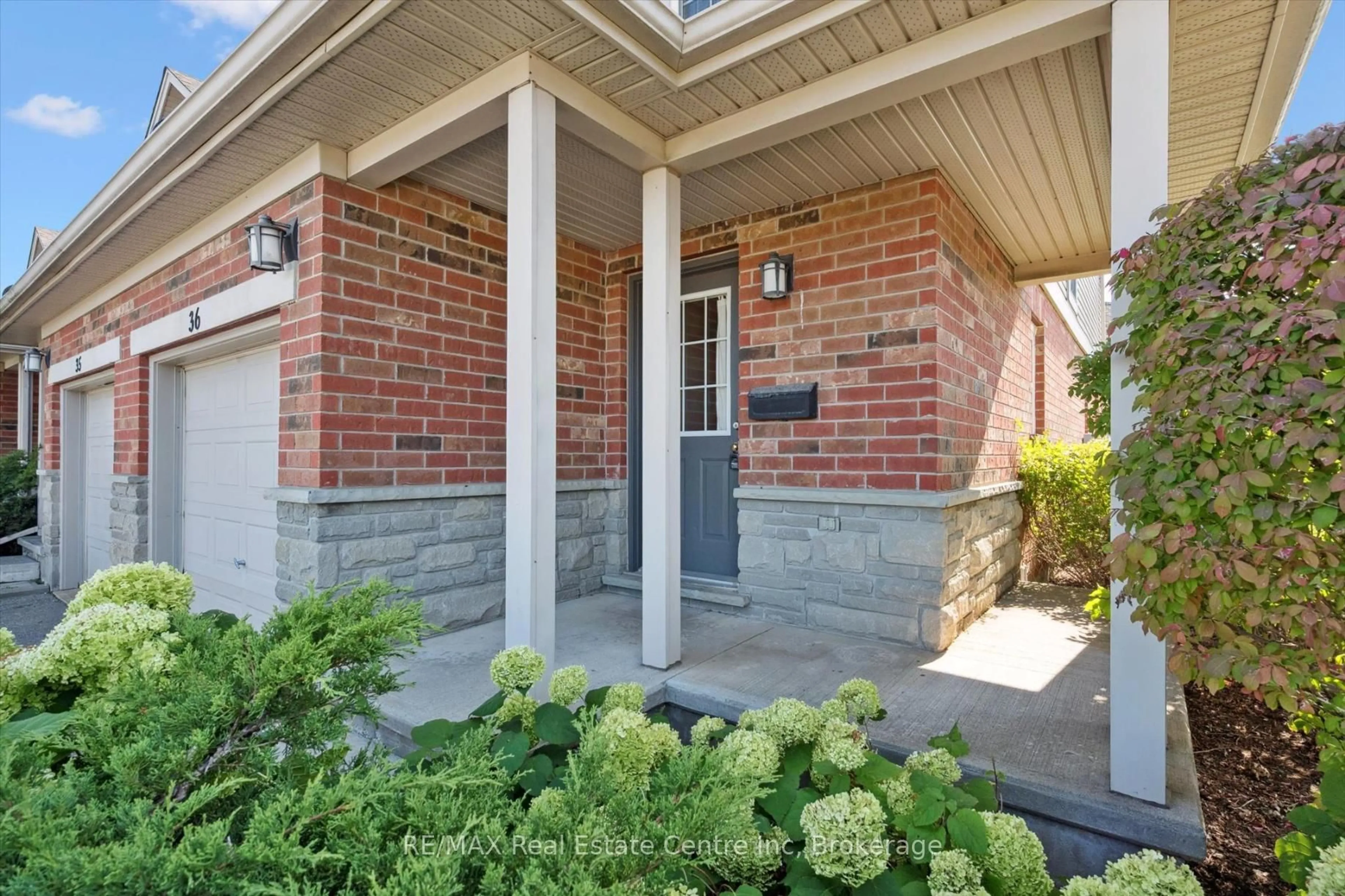 Home with brick exterior material, street for 124 GOSLING Gdns #36, Guelph Ontario N1G 5K6