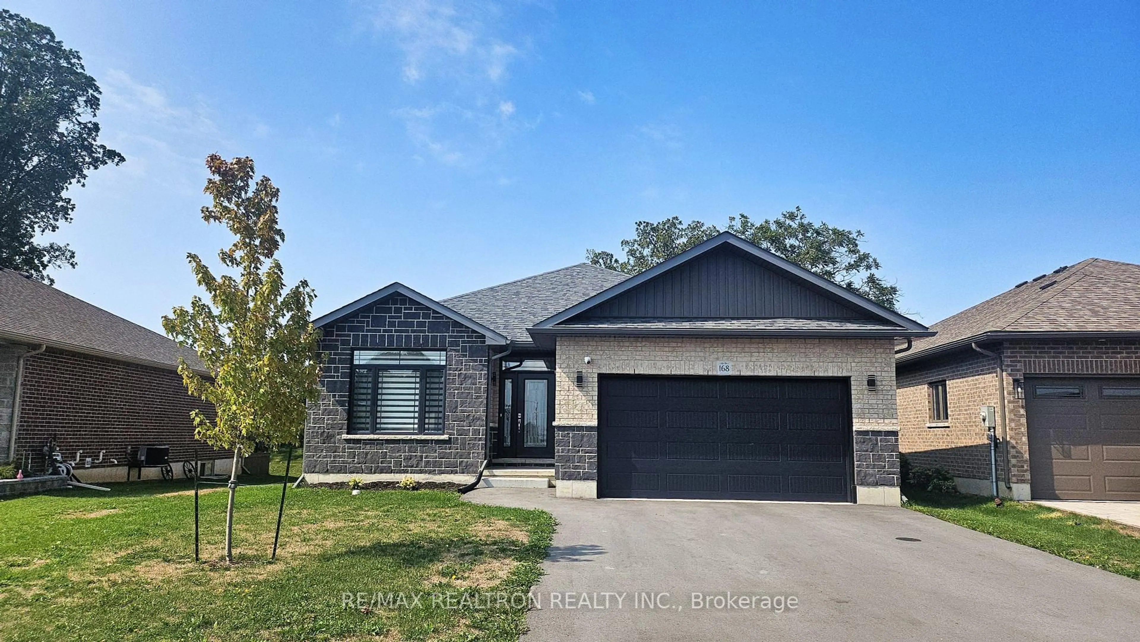 Home with brick exterior material, street for 168 Cherrywood Pkwy, Greater Napanee Ontario K7R 0E2